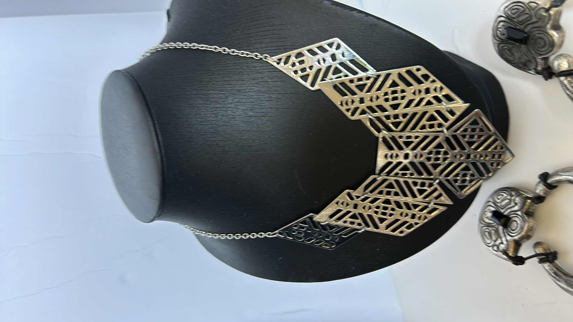 Photo 1 of COSTUME JEWELRY, ONE NECKLACE, TWO PAIRS OF EARRINGS, AND A BARRETTE.