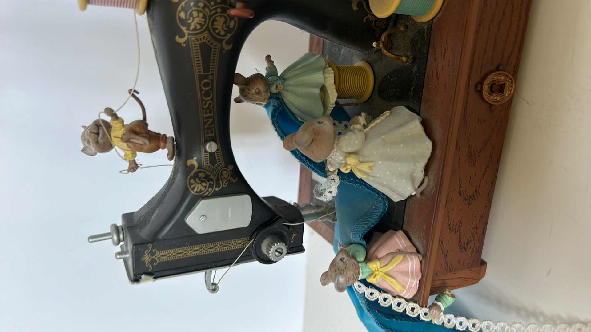 Photo 1 of ENESCO  MUSICAL SEWING MACHINE FIGURINE WITH MINIATURE MICE, PLAYS MY FAVORITE THINGS.