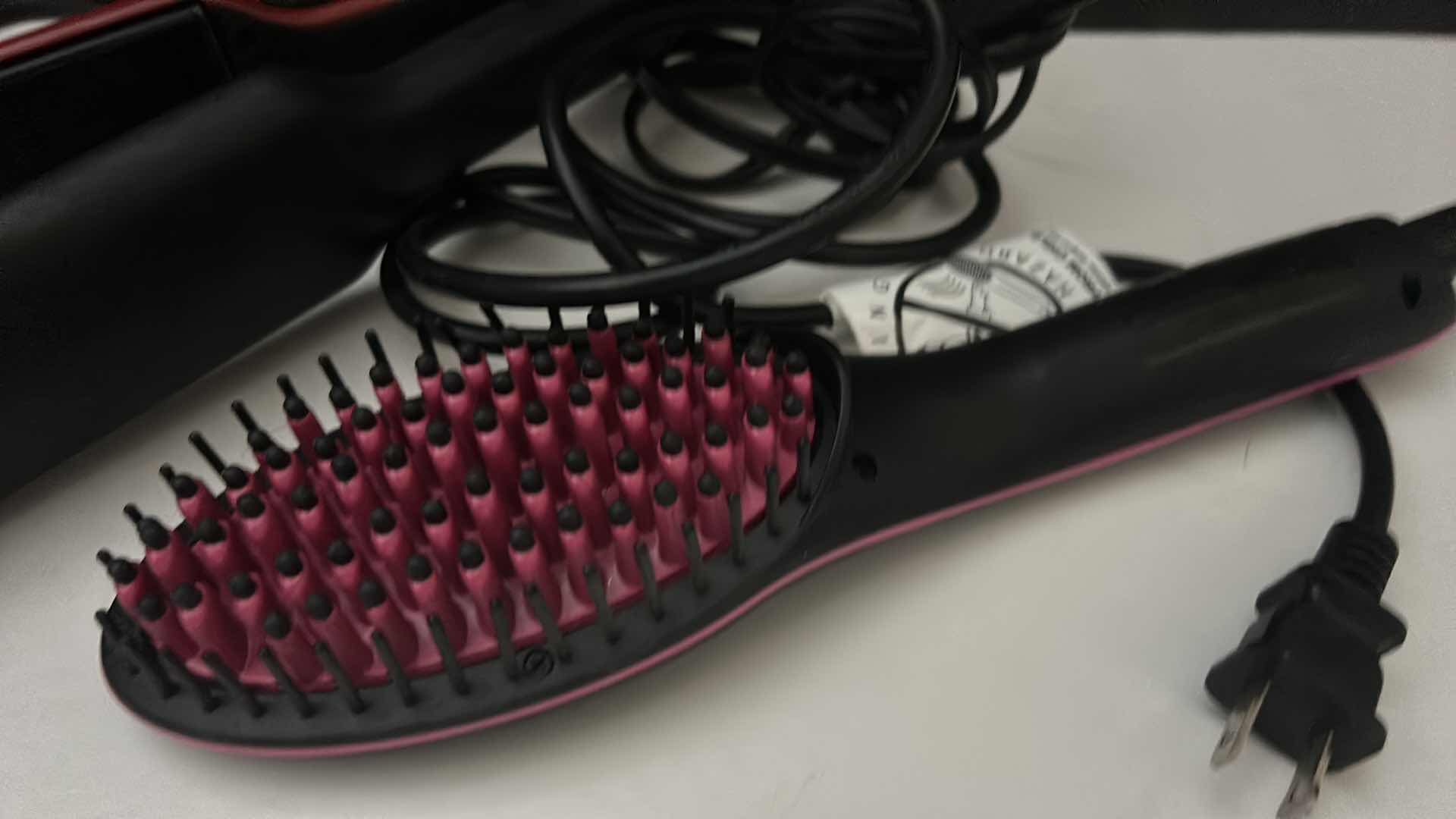 Photo 2 of HAIR STRAIGHTENING TOOLS.