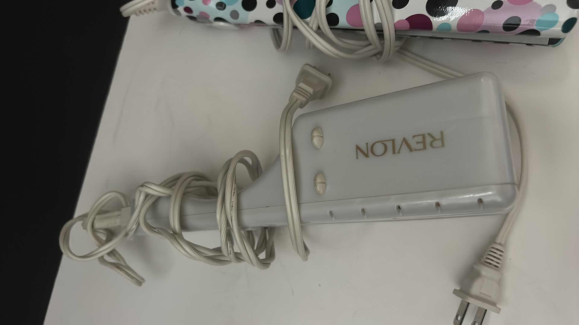 Photo 1 of HAIR STRAIGHTENING TOOLS.