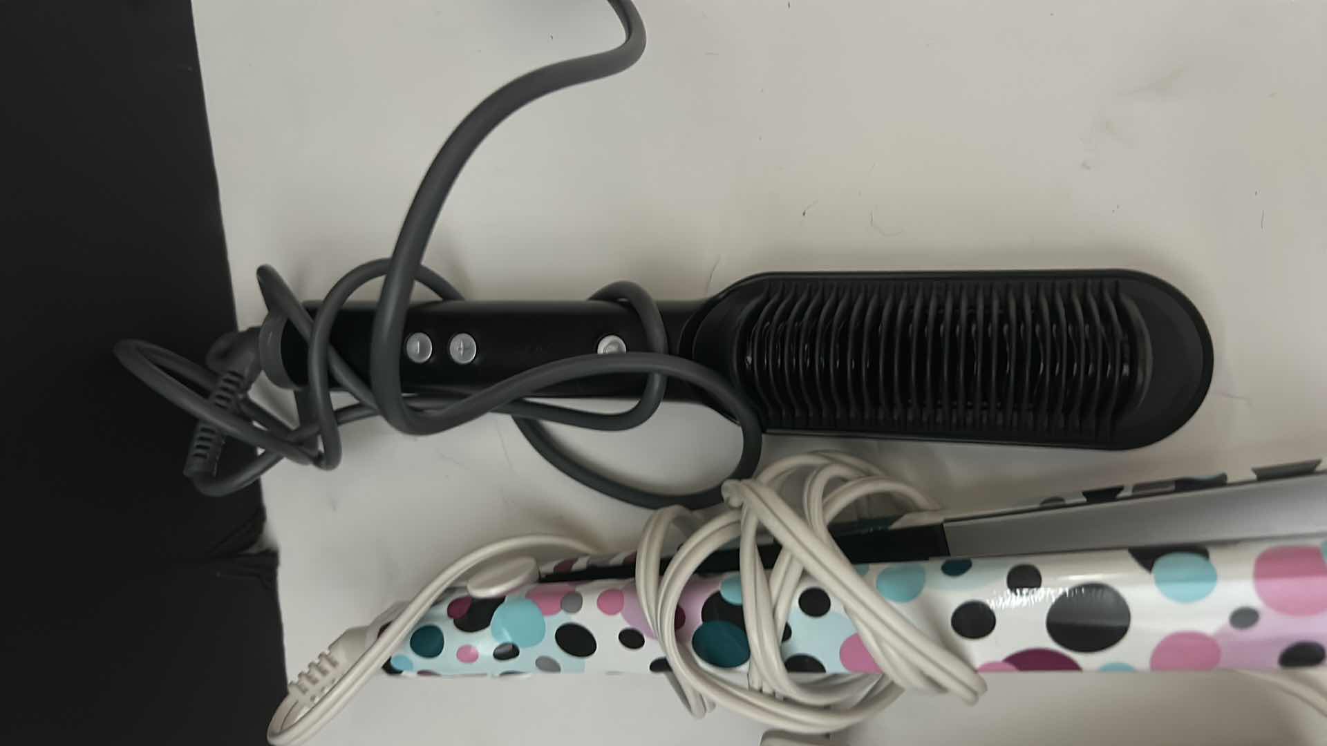 Photo 1 of HAIR STRAIGHTENING TOOLS.