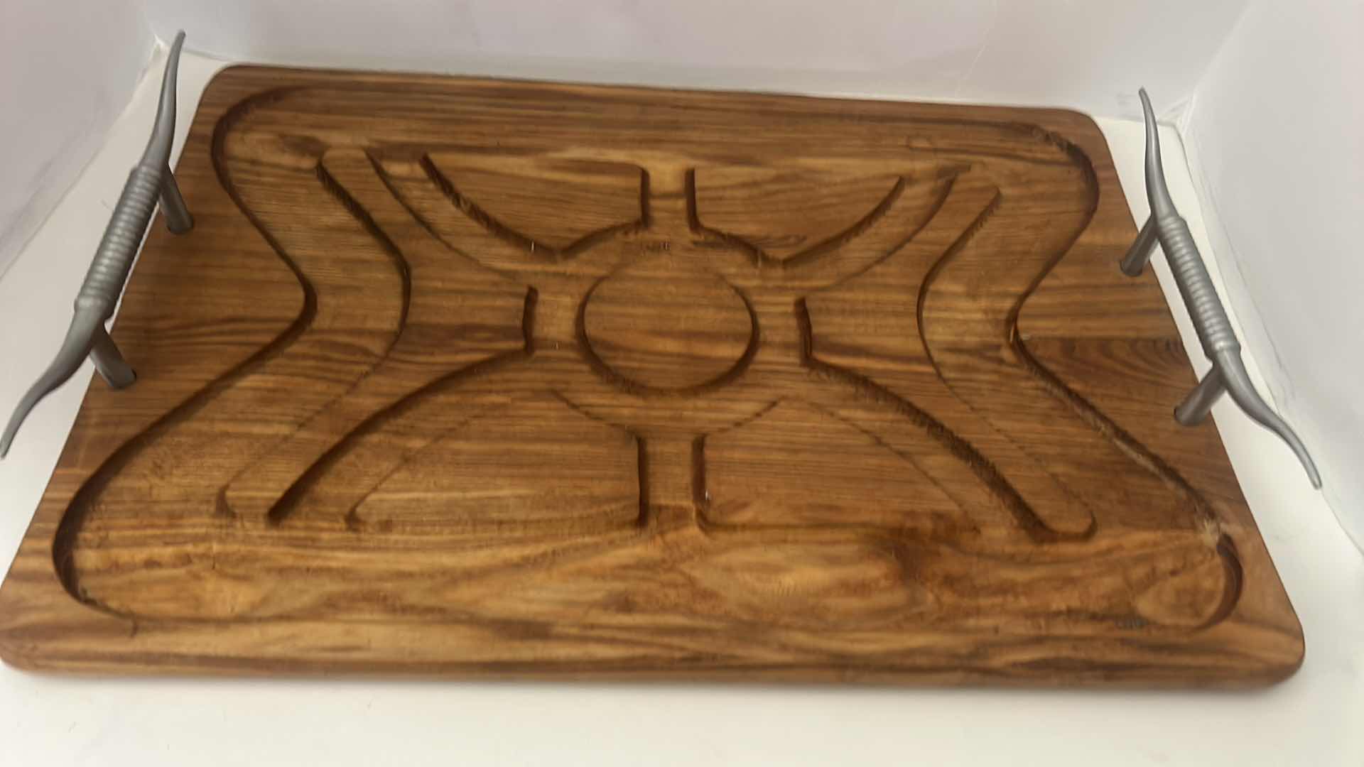 Photo 1 of CHARCUTERIE BOARD WITH METAL HORN HANDLES. 20” x 13 1/2”