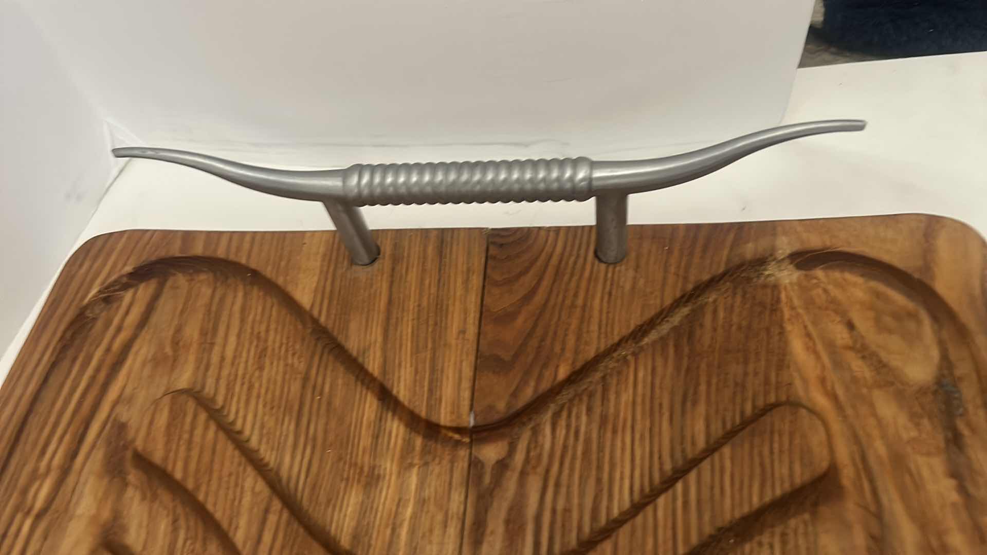 Photo 1 of CHARCUTERIE BOARD WITH METAL HORN HANDLES. 20” x 13 1/2”
