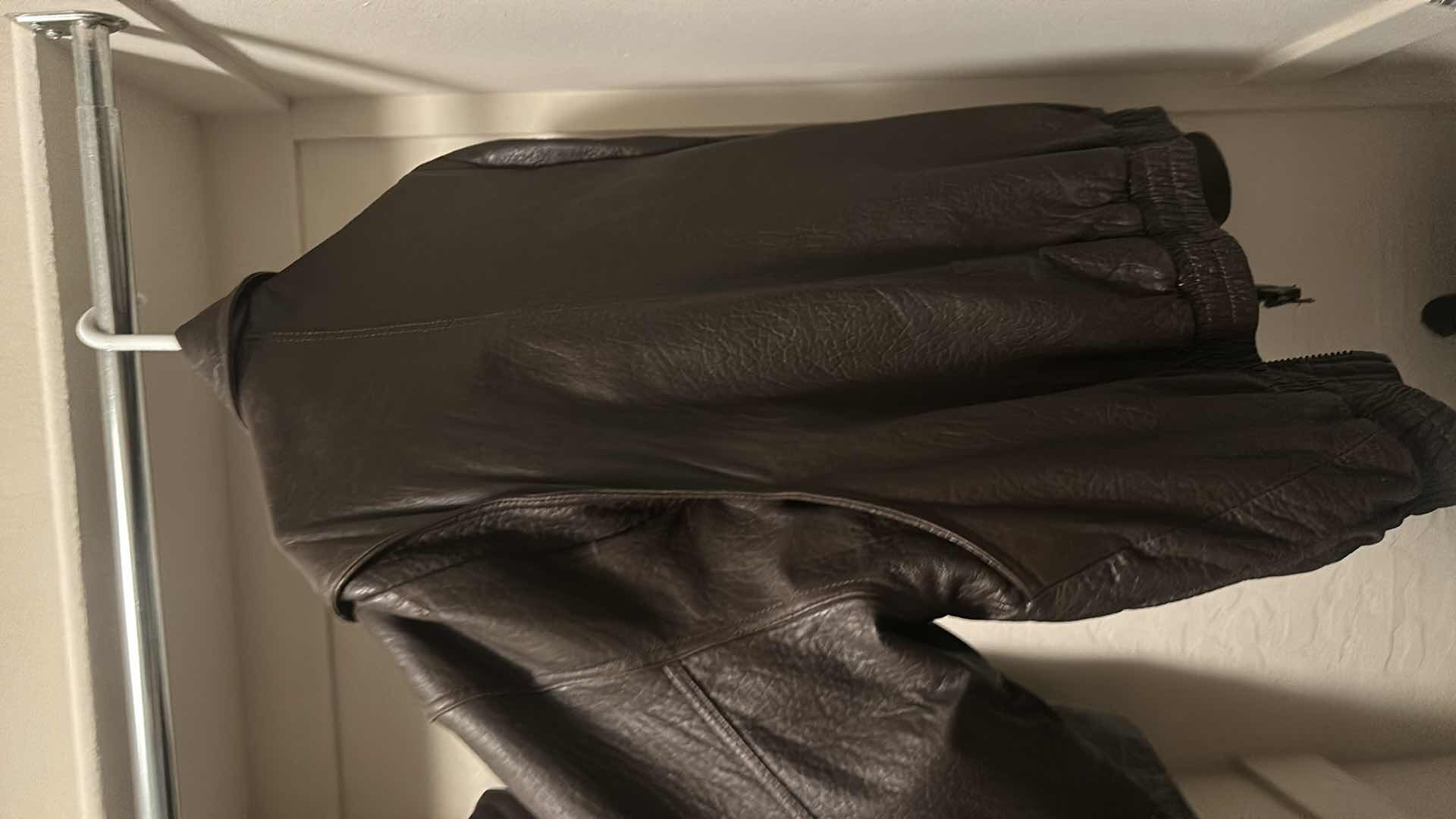 Photo 1 of MEN’S LEATHER VEST SIZE 2XL. MEN’S LEATHER JACKET SIZE 42.