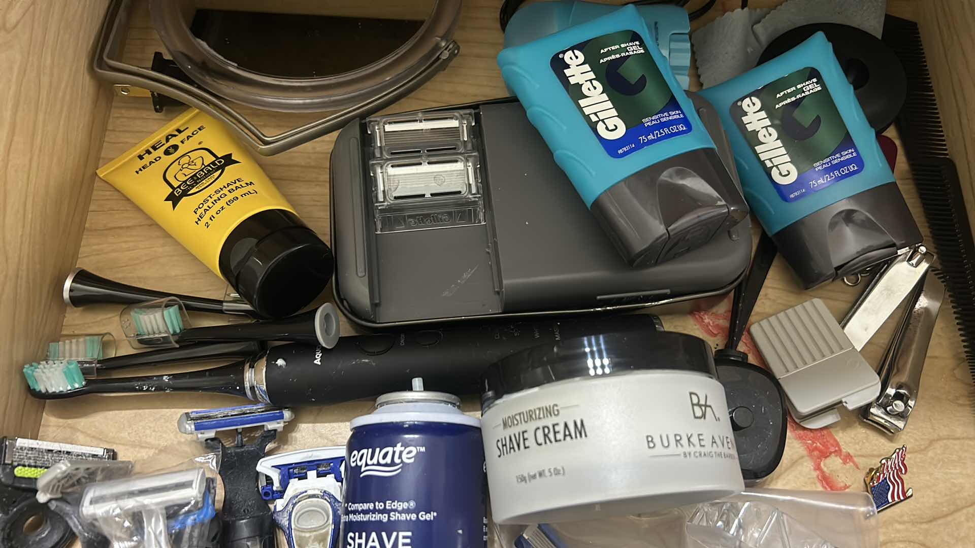 Photo 1 of MEN’S SHAVING PRODUCTS, ELECTRIC TOOTHBRUSH, AND MORE.