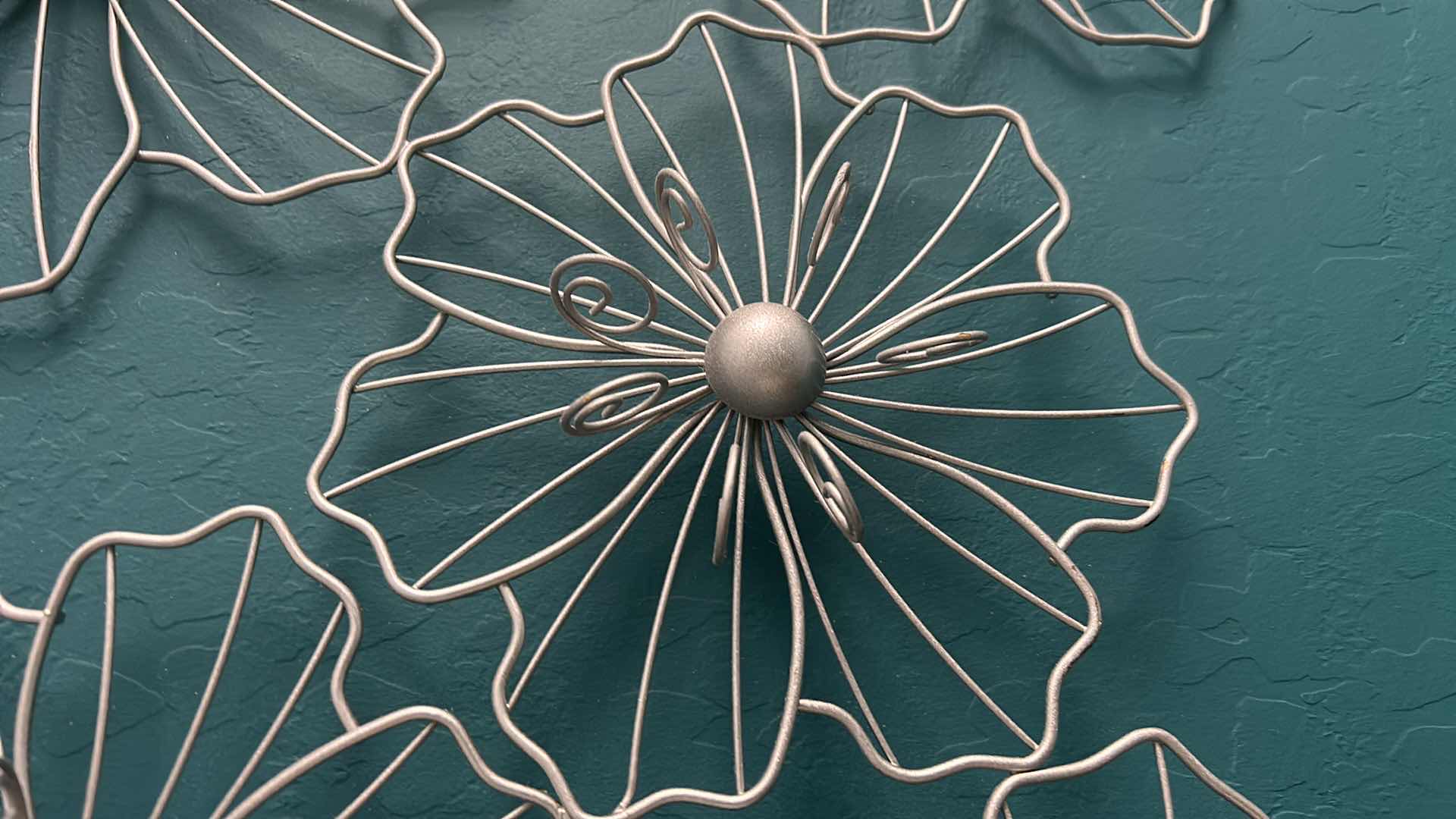 Photo 1 of METAL FLOWER WALL DÉCOR 42” X H 21”.