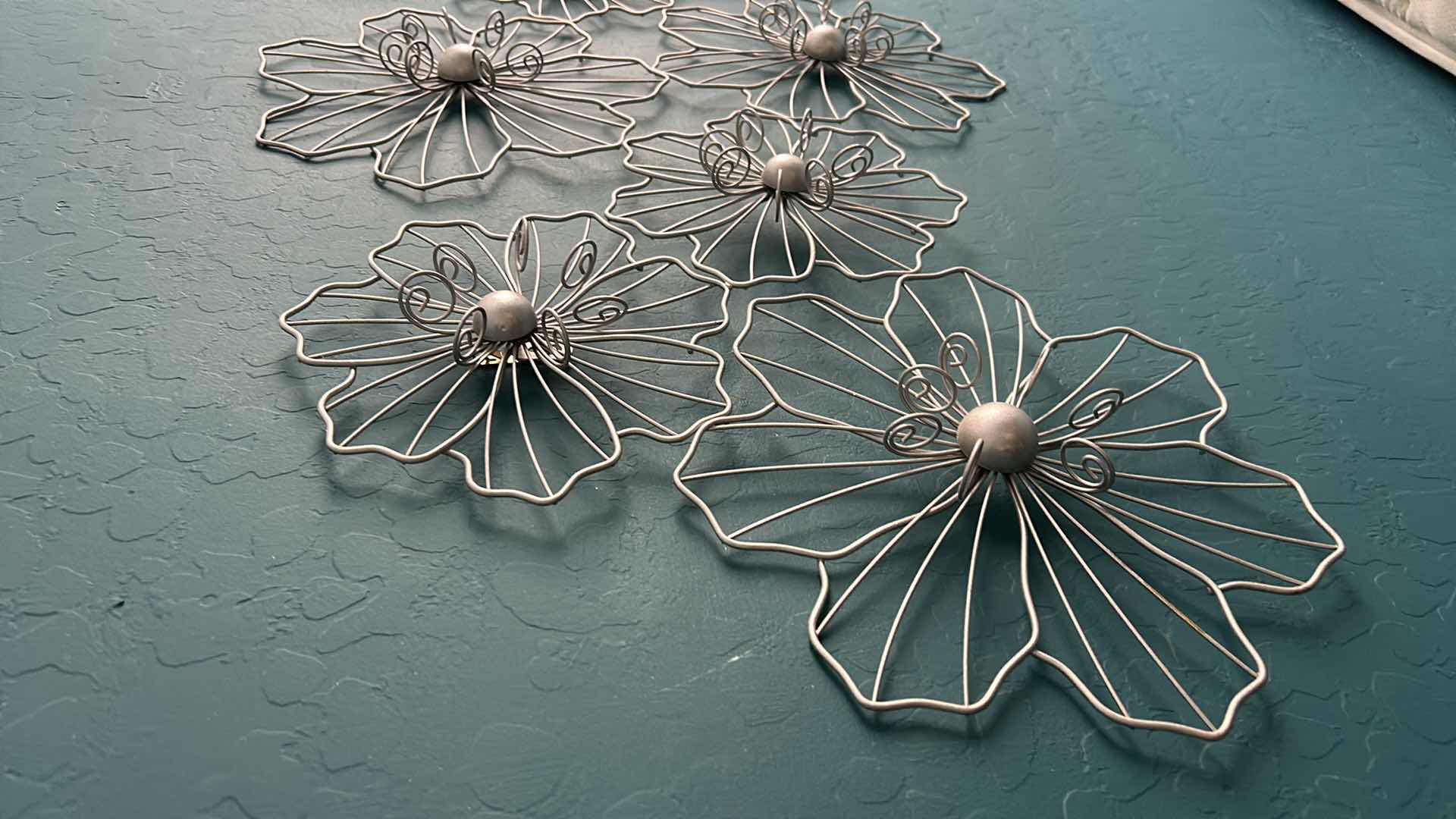 Photo 1 of METAL FLOWER WALL DÉCOR 42” X H 21”.