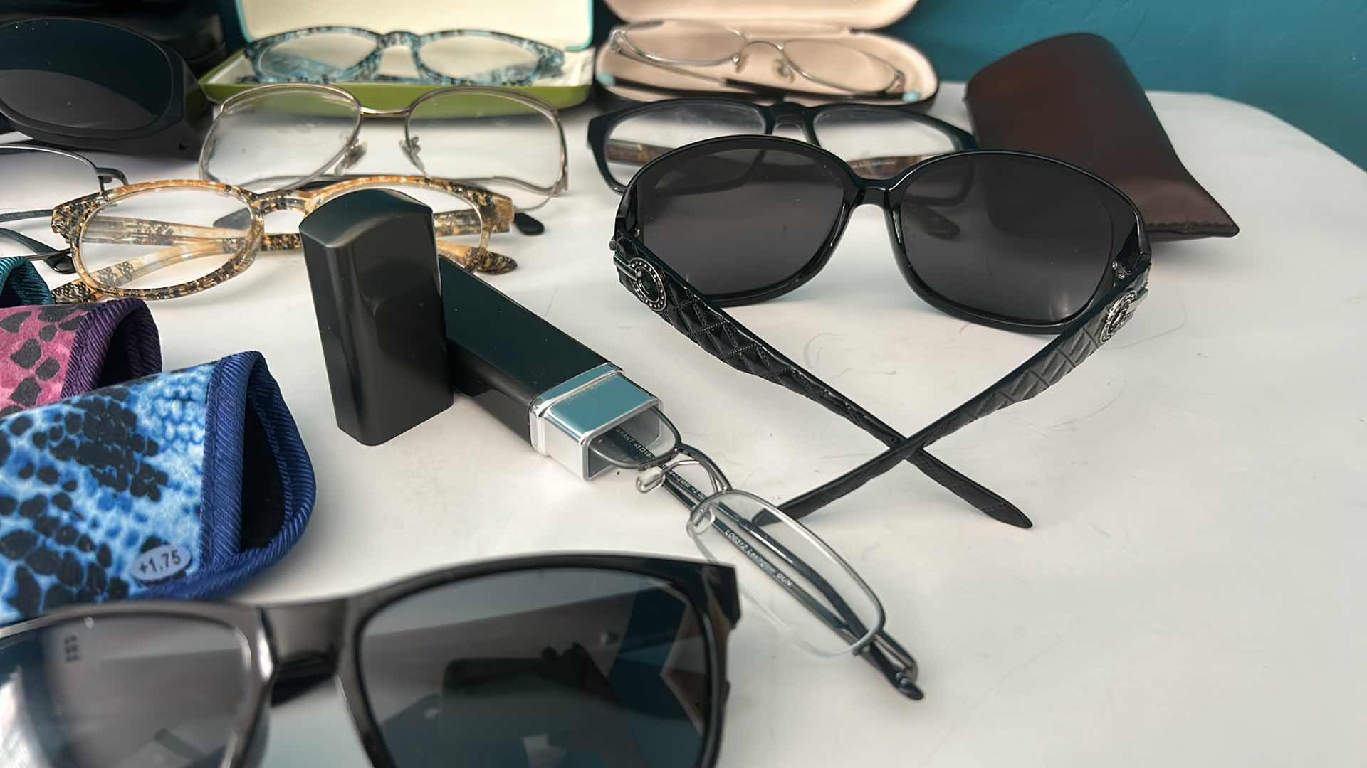 Photo 1 of EYEGLASSES AND SUNGLASSES WITH ASSORTED CASES.