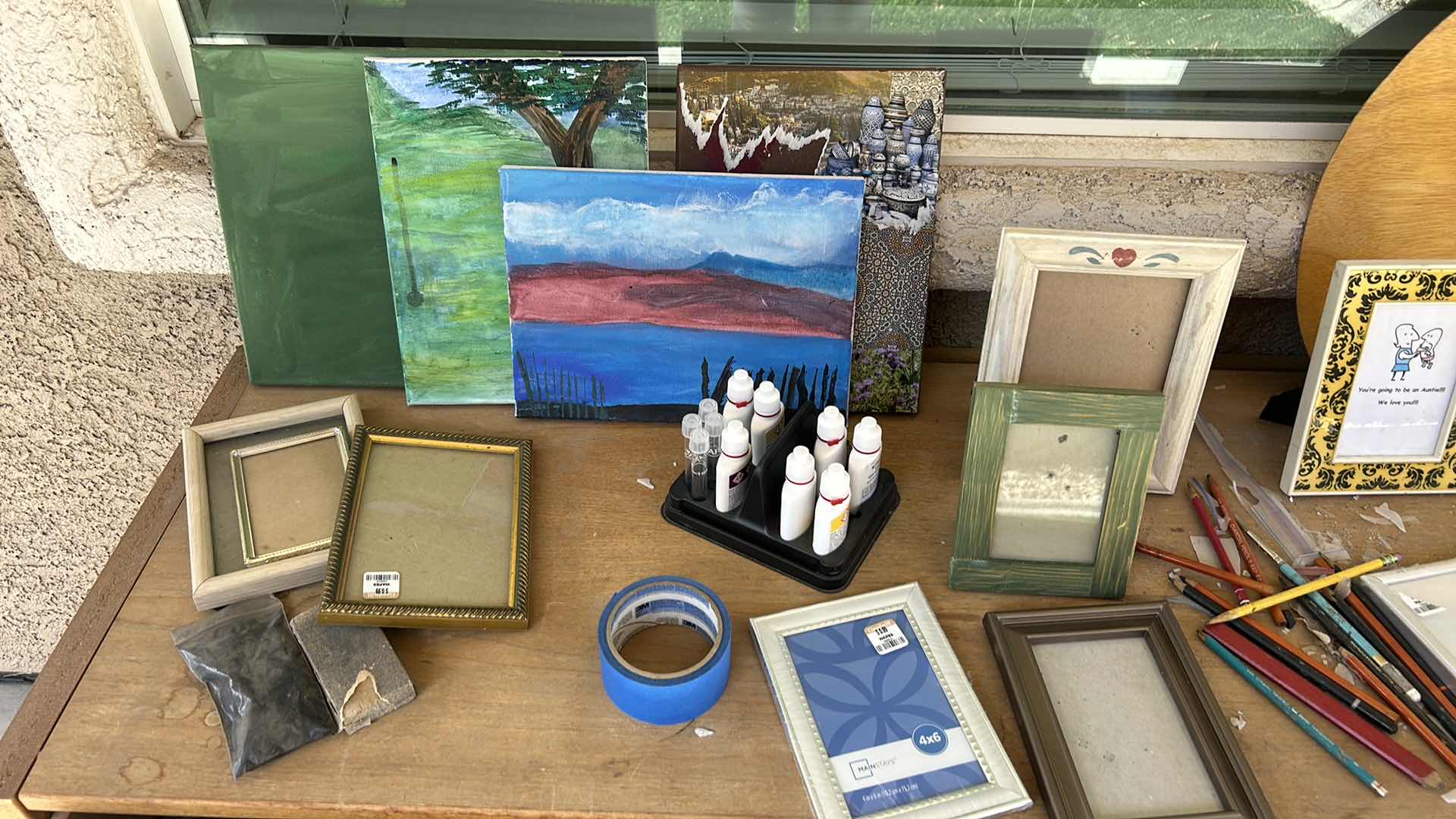 Photo 1 of CABINET FULL OF PICTURE FRAMES AND ART SUPPLIES.