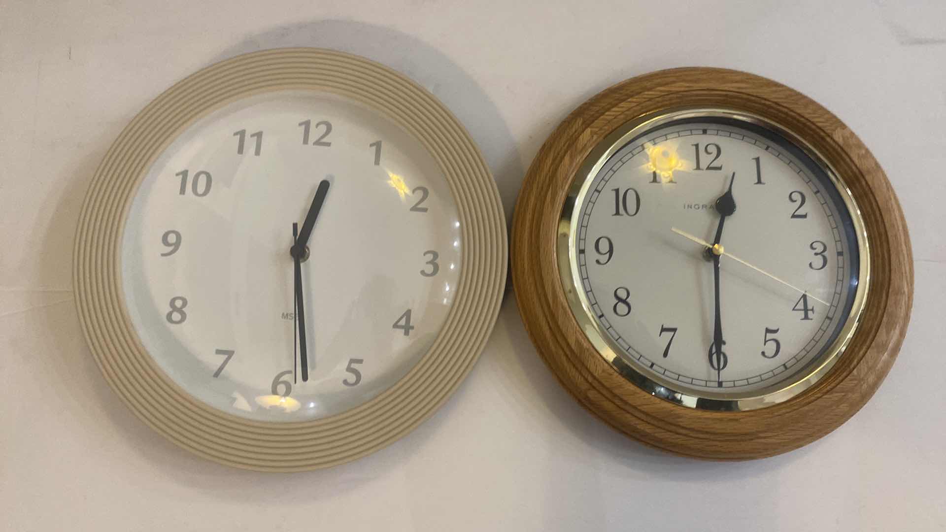 Photo 1 of 2 BATTERY POWERED 11” WALL CLOCKS