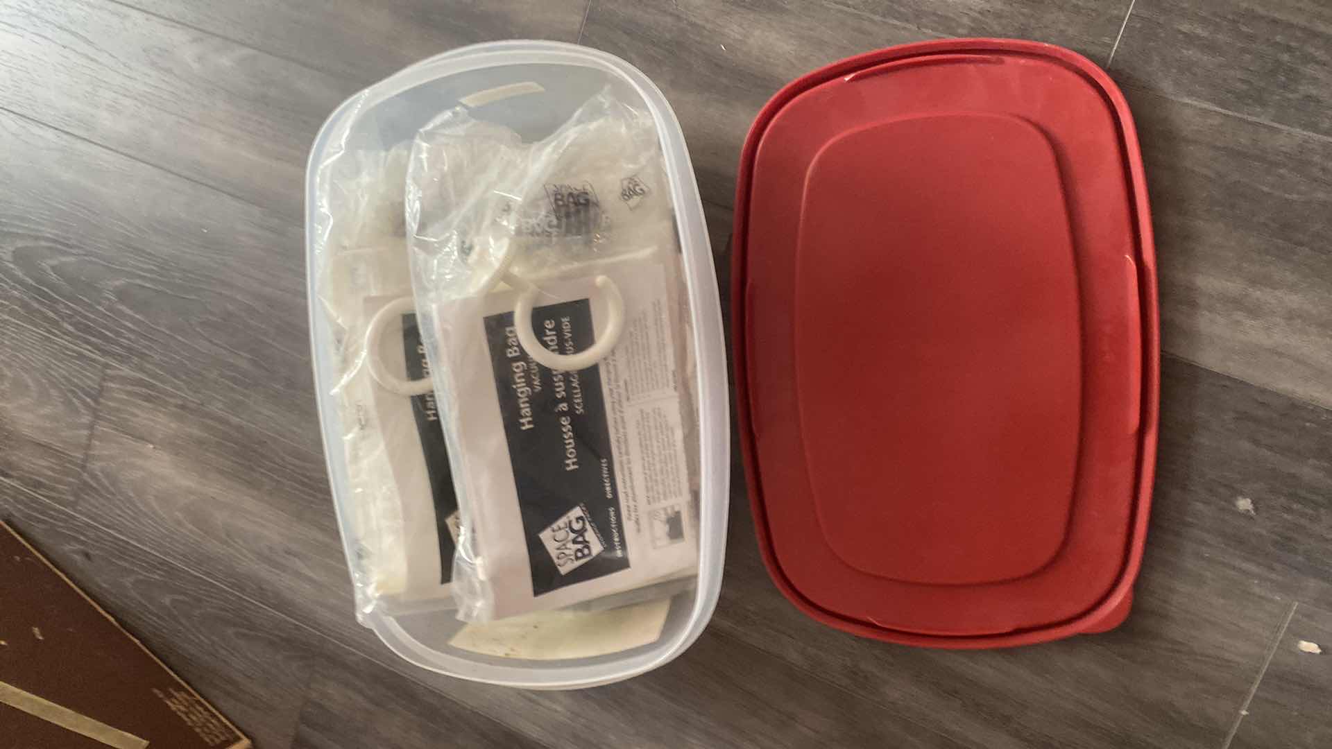 Photo 1 of 3 SPACE BAG HANGING BAGS IN RUBBERMAID CONTAINER WITH LID