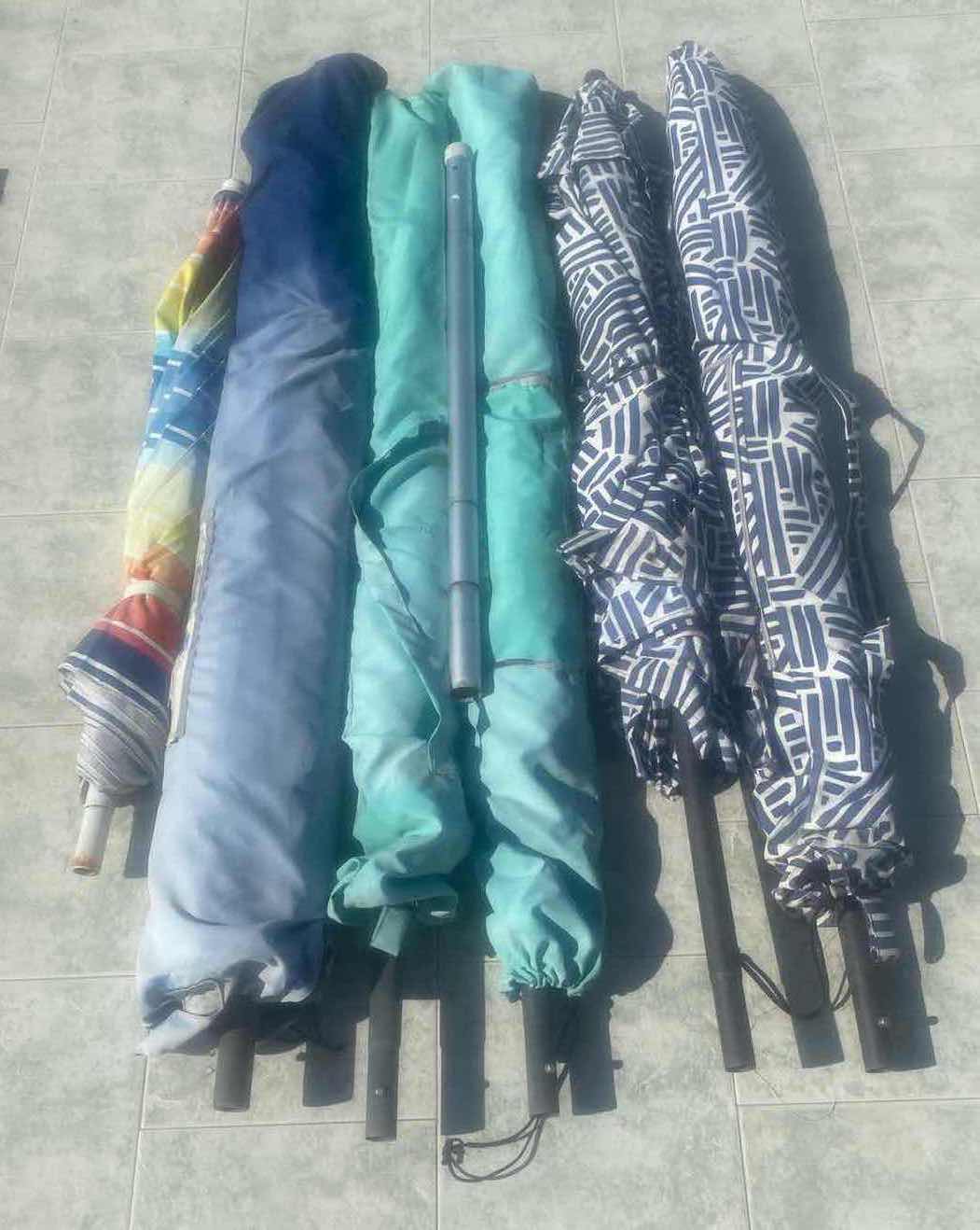 Photo 1 of 6 UMBRELLAS - SOME POLES MISSING