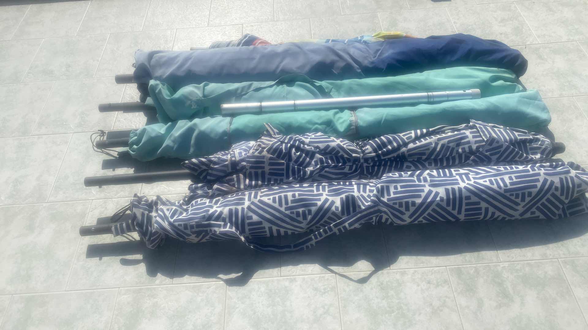 Photo 2 of 6 UMBRELLAS - SOME POLES MISSING