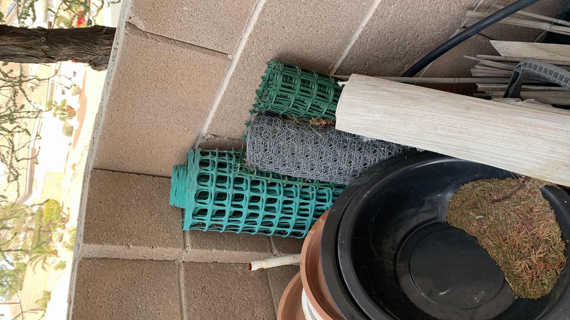 Photo 1 of ASSORTED ROLLS OF FENCING AND PLANTERS