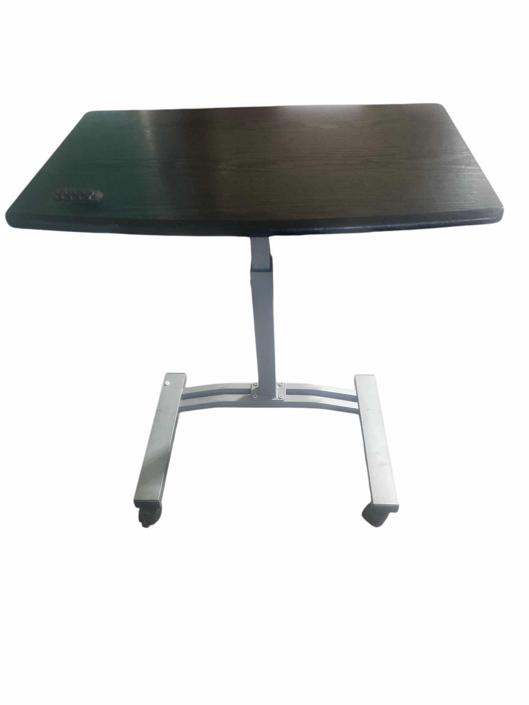 Photo 1 of BLACK PRESSBOARD TOP ADJUSTABLE HEIGHT BED TABLE 23” x 16” H27”