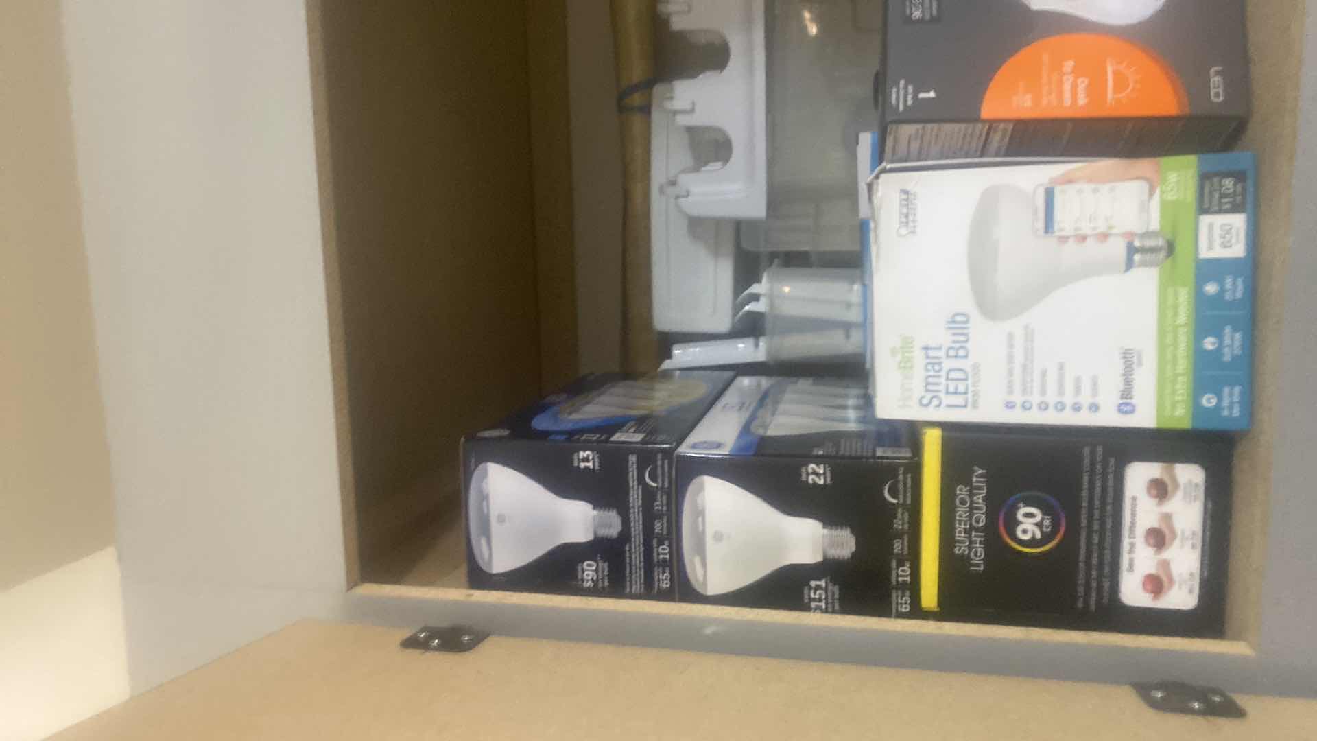 Photo 1 of CONTENTS OF CABINET - LIGHT BULBS