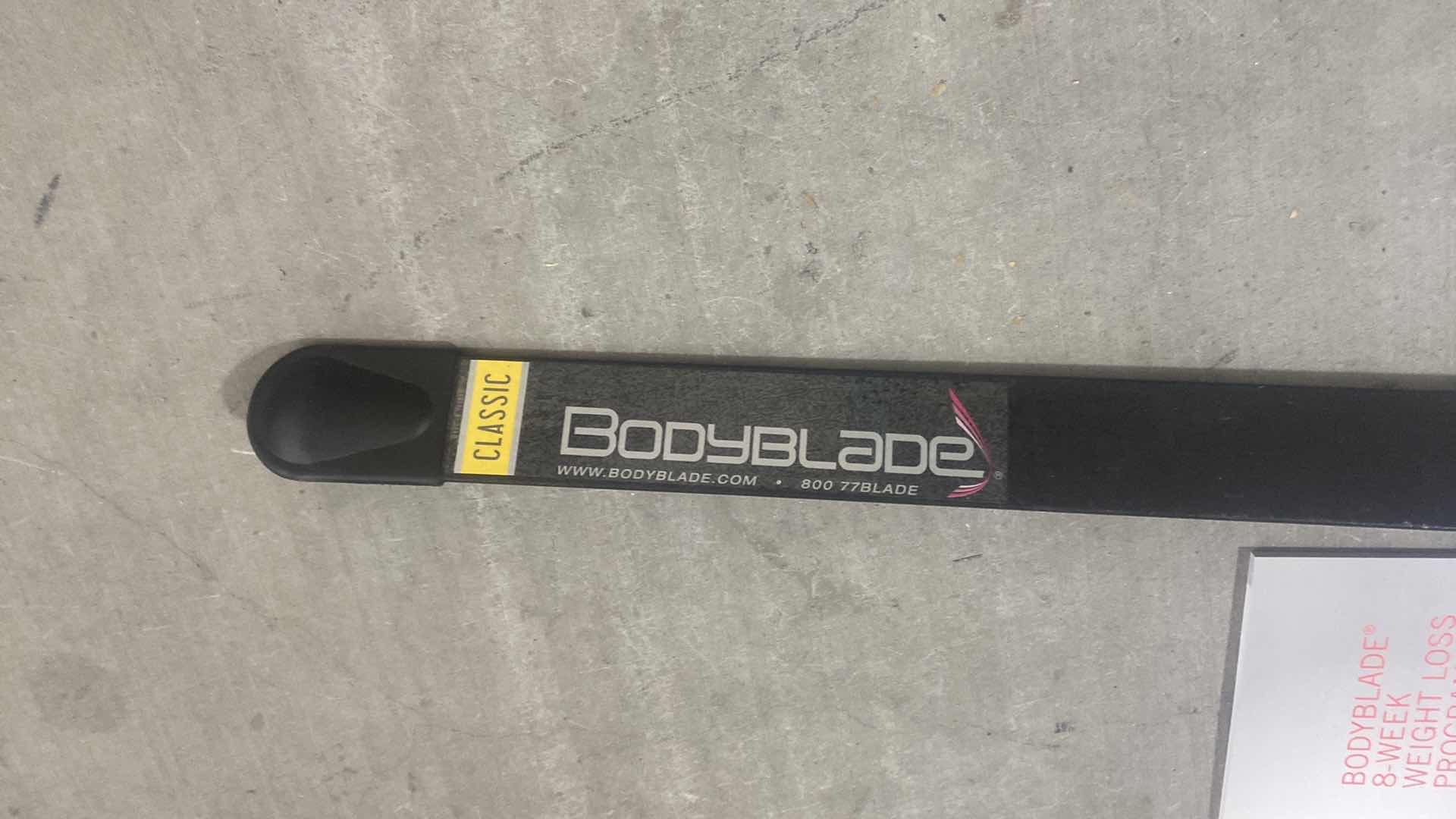 Photo 1 of BODYBLADE WITH WORK OUT DVD AND WRIST SUPPORTS