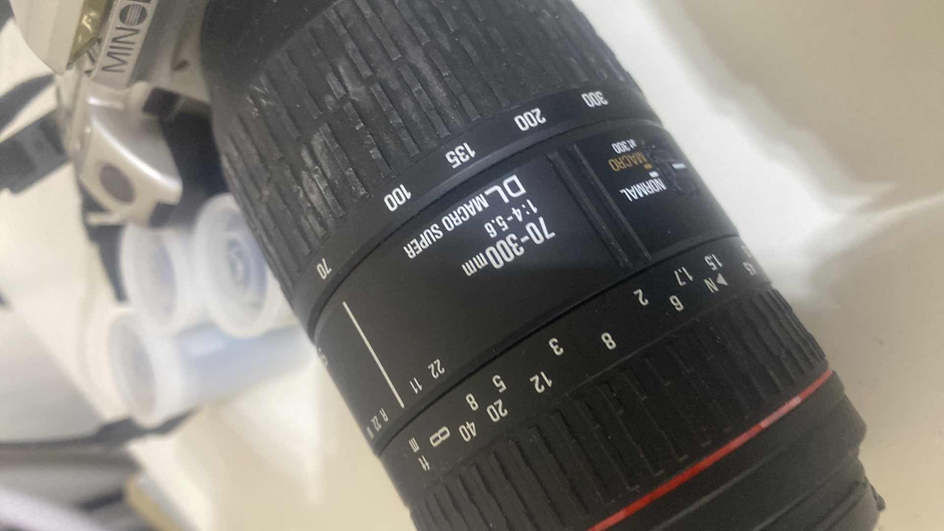 Photo 1 of MINOLTA CAMERA WITH EXTRA LENS & BAG