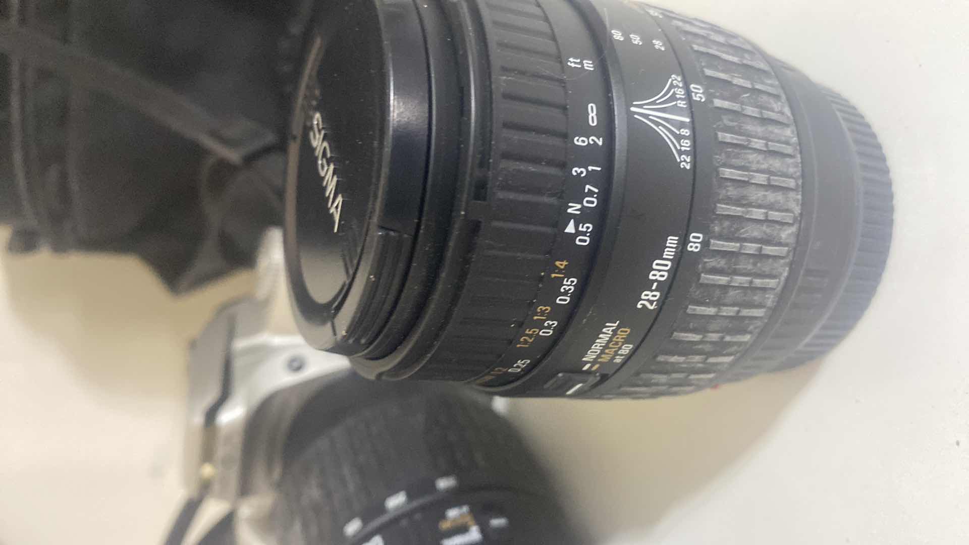 Photo 1 of MINOLTA CAMERA WITH EXTRA LENS & BAG