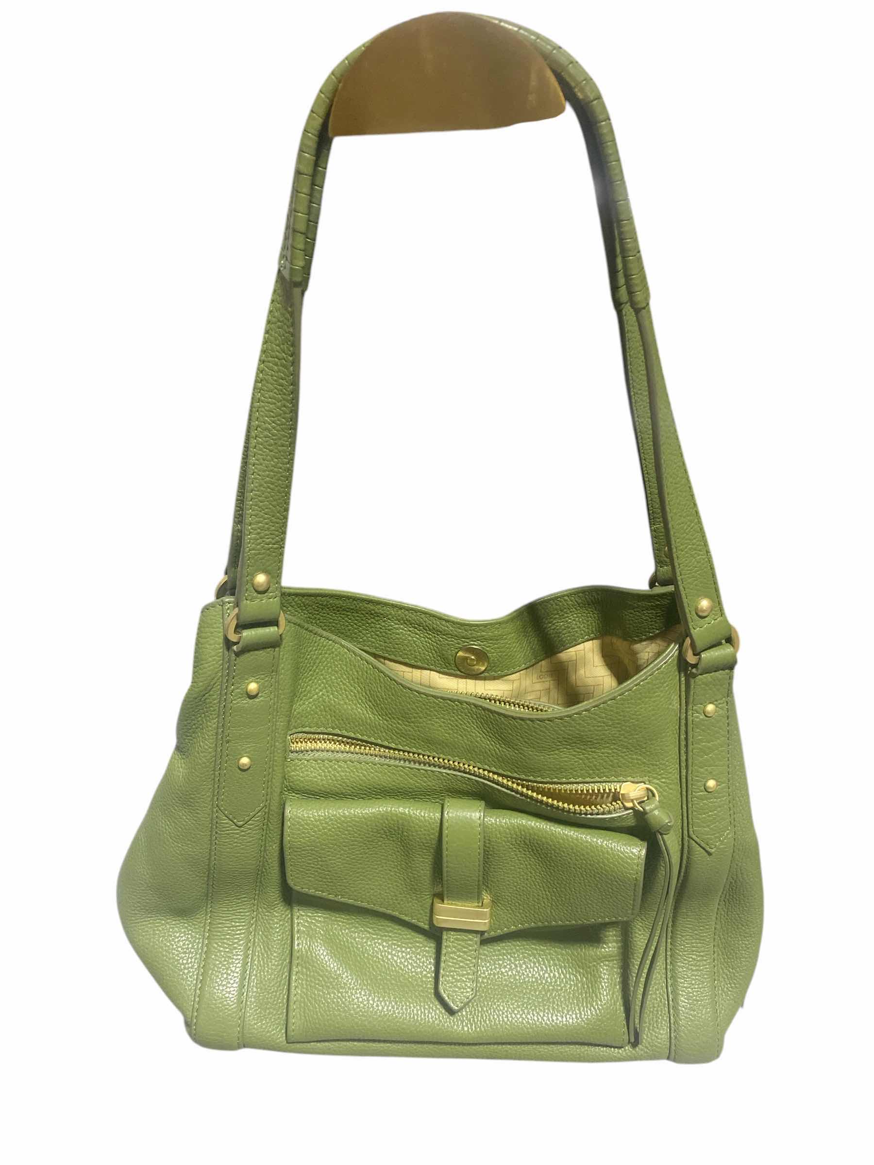 Photo 1 of $100 LODIS MADISON FRONT POCKET HANDBAG - GREEN