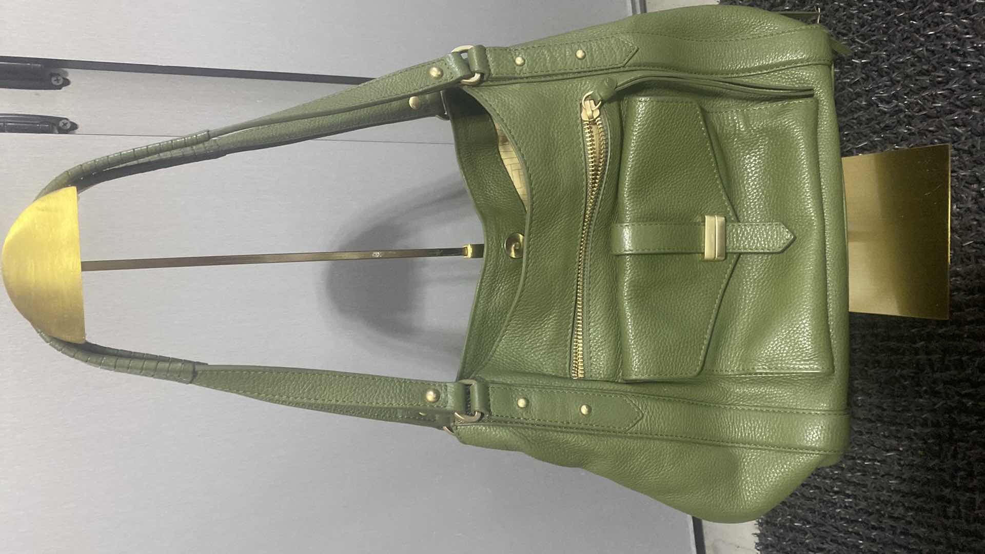 Photo 1 of $100 LODIS MADISON FRONT POCKET HANDBAG - GREEN