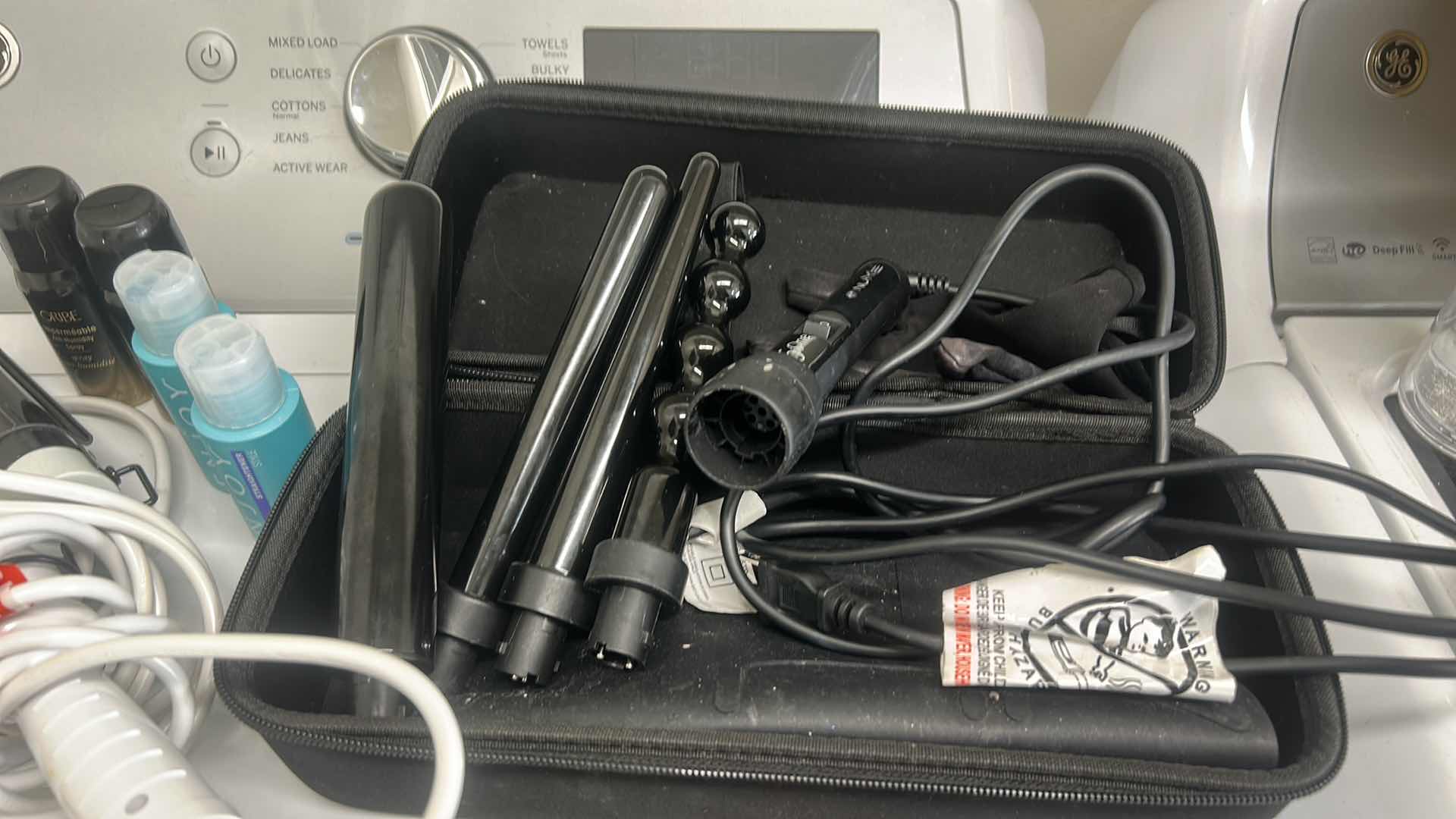 Photo 1 of CURLING IRONS AND HAIR PRODUCTS