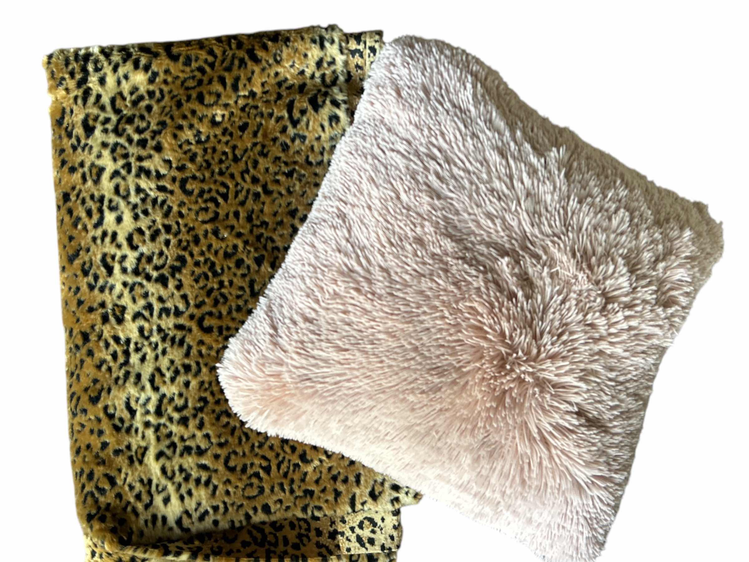 Photo 1 of FAUX ANIMAL PRINT FABRIC AND ROSE SHAGGY PILLOW 
19” x 19”