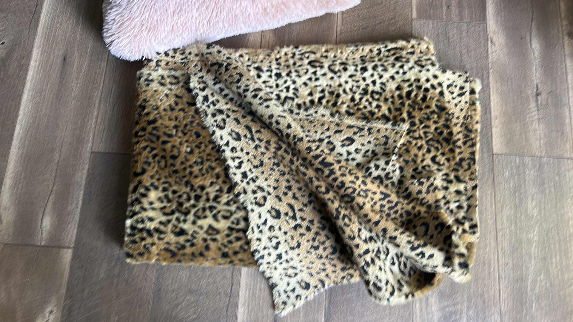 Photo 1 of FAUX ANIMAL PRINT FABRIC AND ROSE SHAGGY PILLOW 
19” x 19”