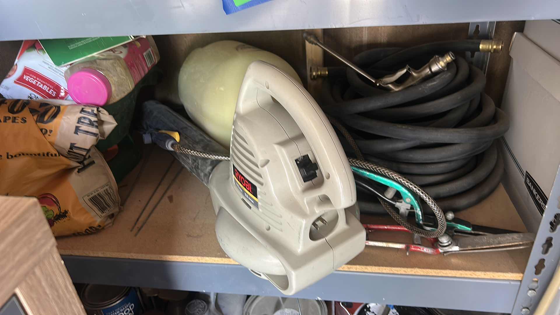 Photo 1 of CONTENTS ON SHELF IN SHED