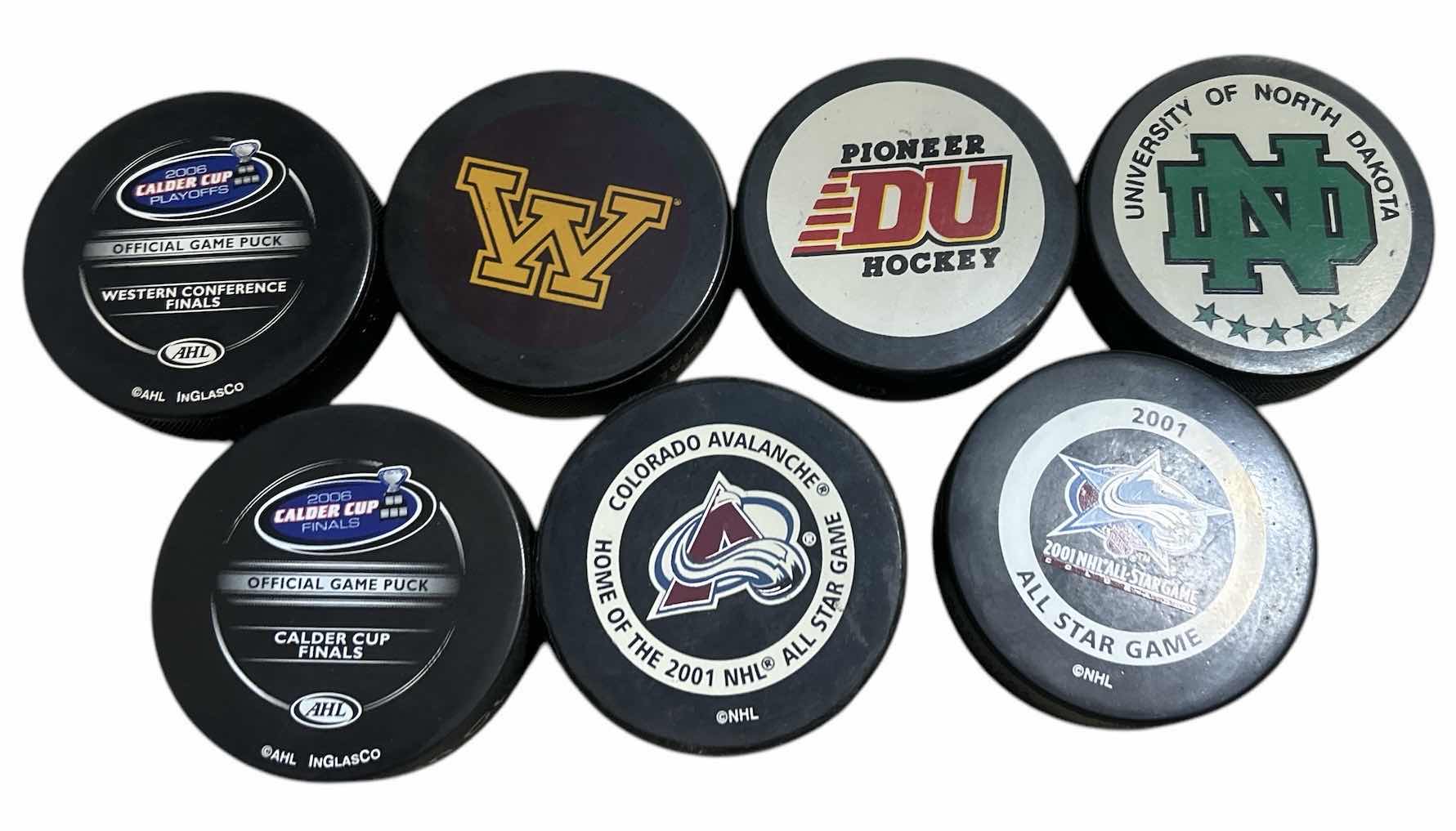 Photo 1 of 7 HOCKEY PUCKS