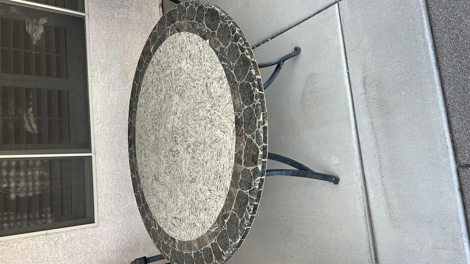 Photo 1 of ROUND HEAVY STONE TOP OUTDOOR TABLE 54“ x H28 1/2“