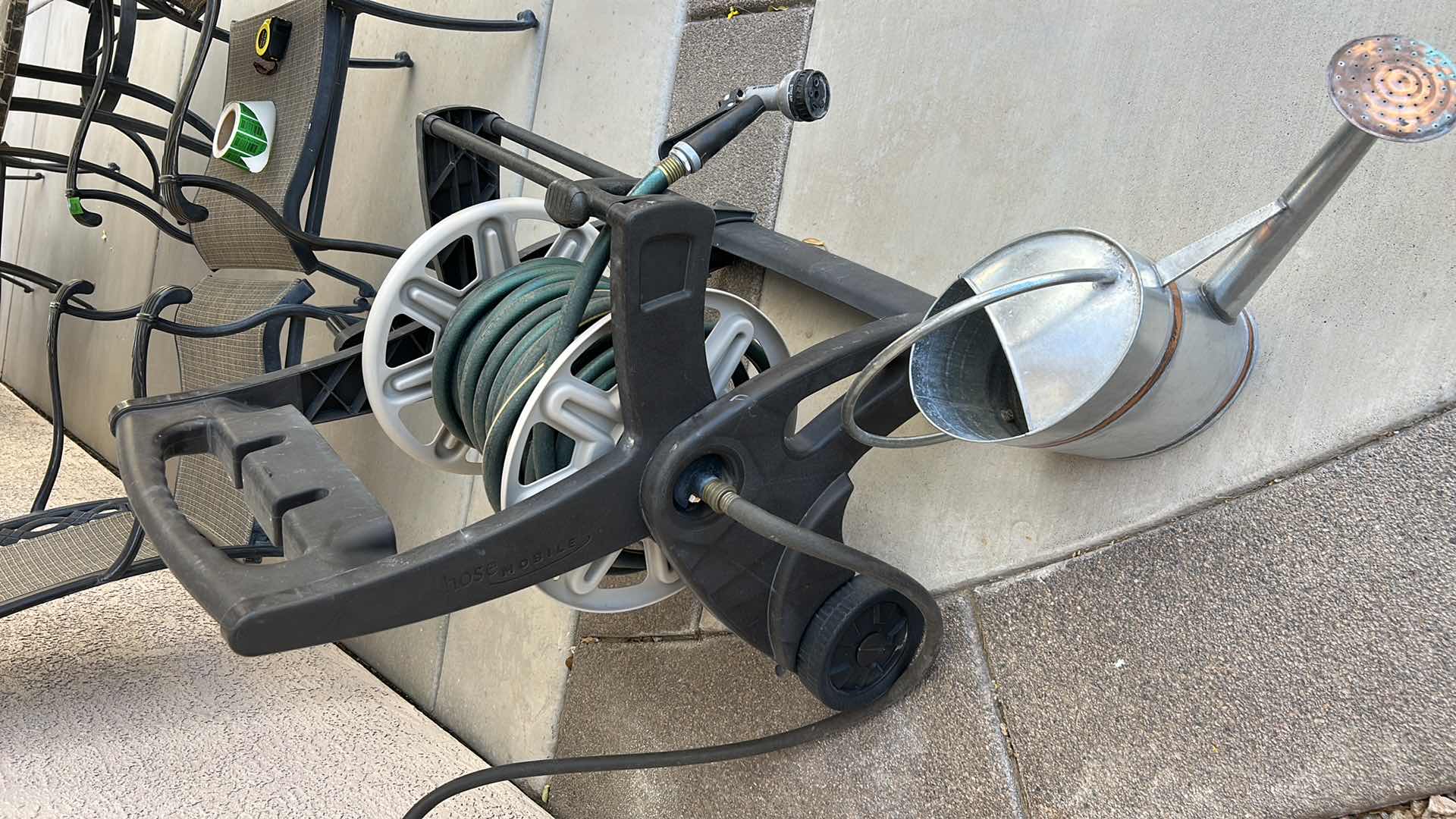 Photo 1 of HOSE, HOSE CART AND WATERING TIN