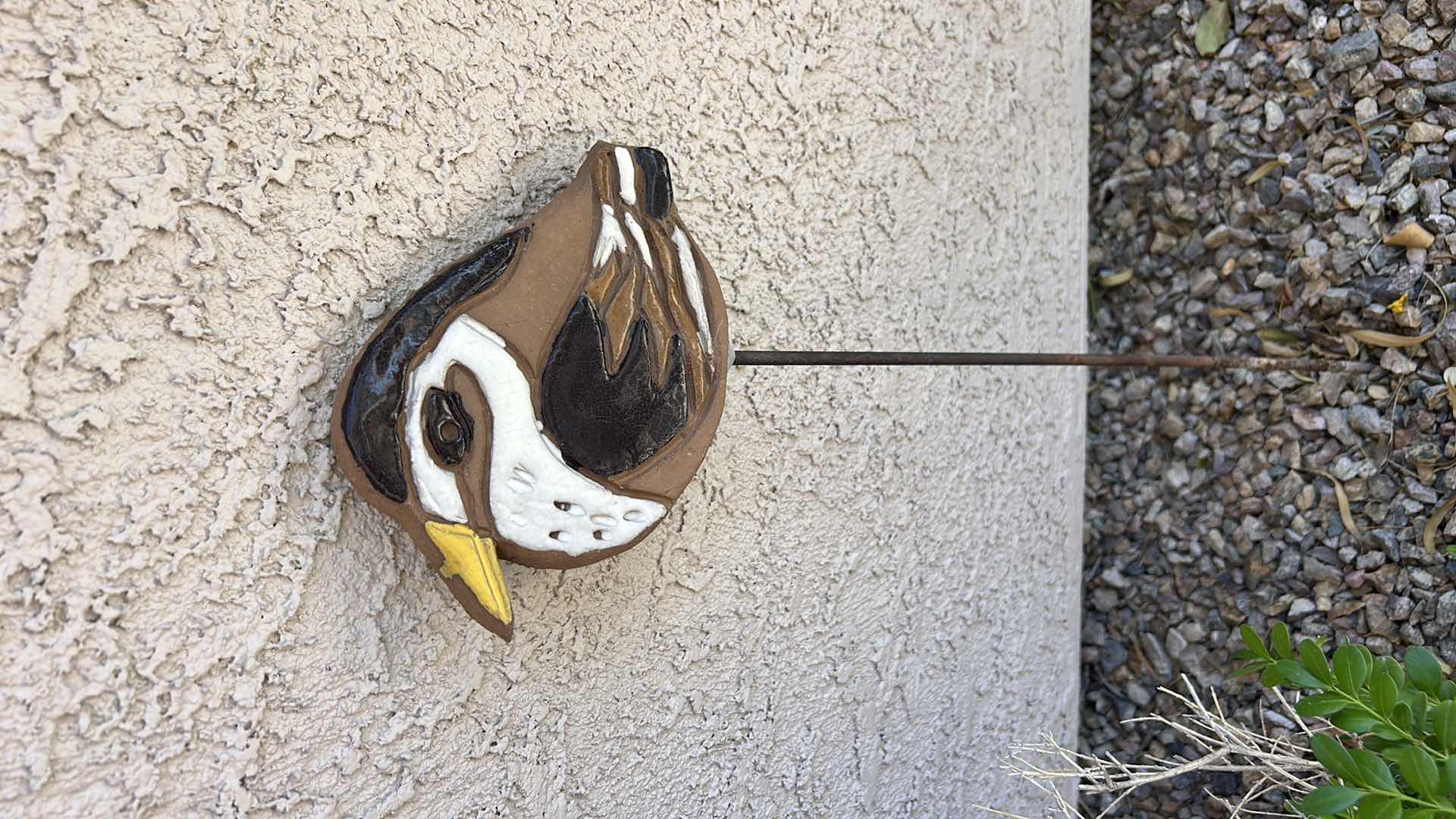 Photo 1 of OUTDOOR DECOR- PAINTED GLAZED POTTERY BIRD ON MOST H28”