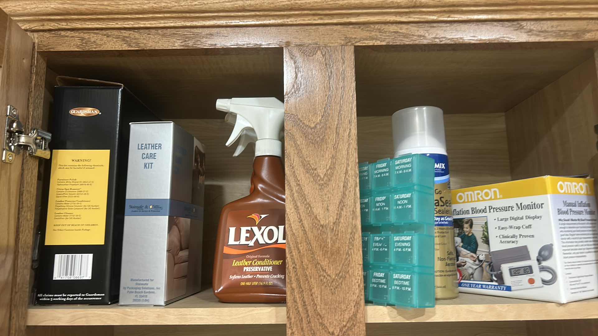 Photo 1 of CONTENTS OF CABINET IN LAUNDRY ROOM