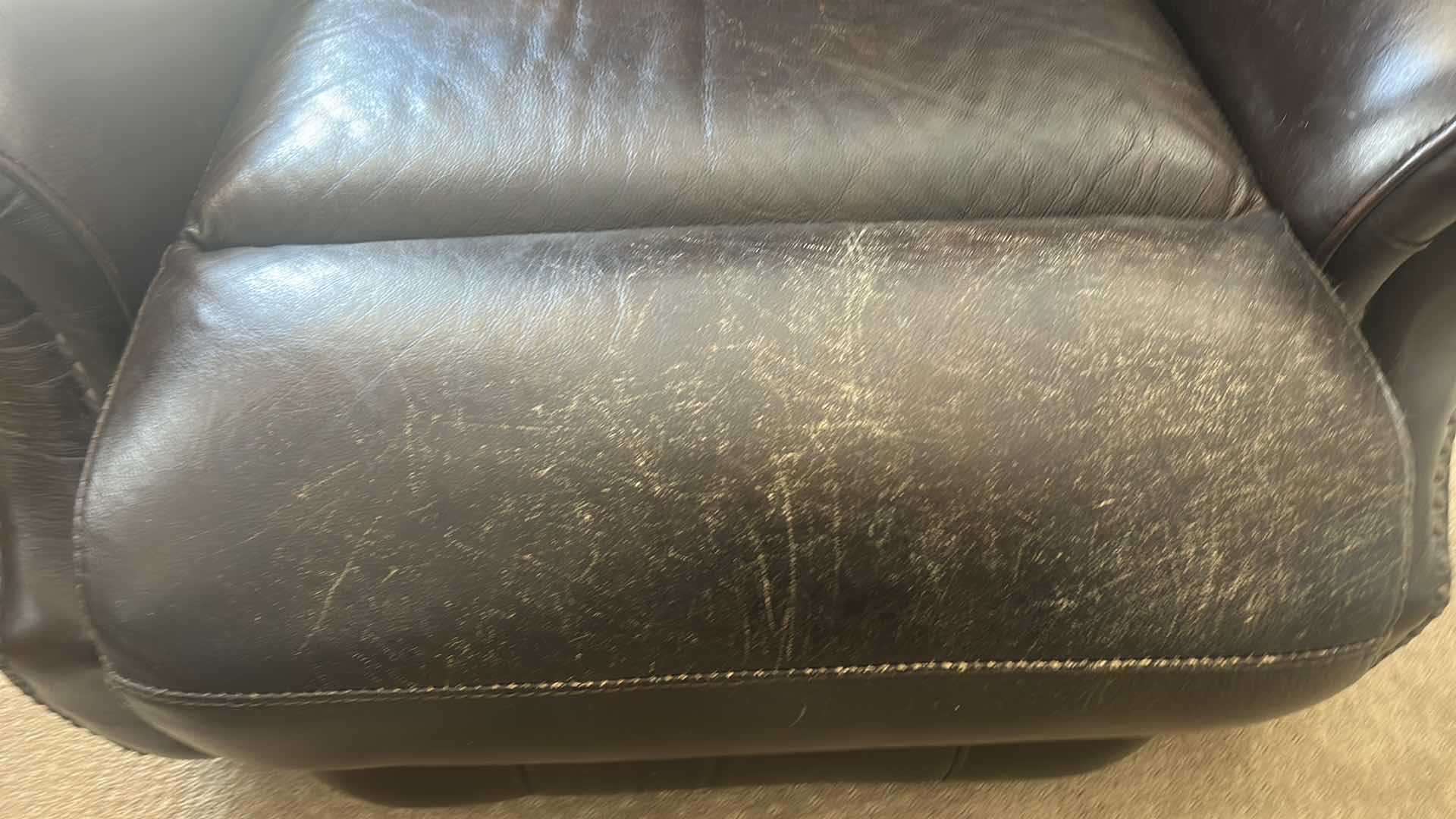 Photo 1 of BROWN LEATHER ROCKING CHAIR