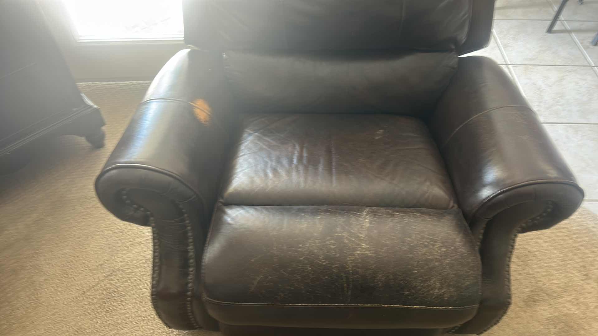 Photo 1 of BROWN LEATHER ROCKING CHAIR