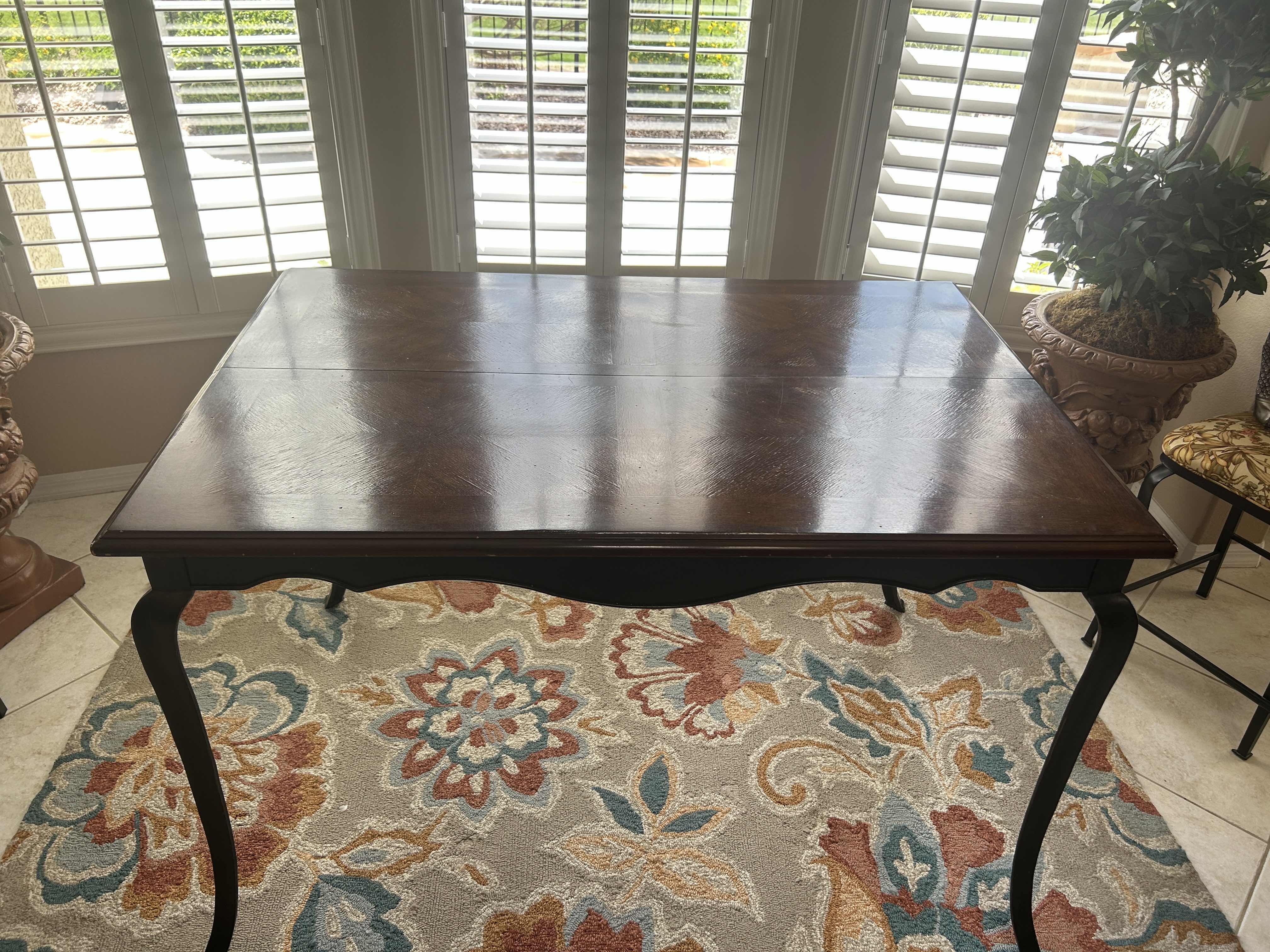 Photo 1 of DARK SOLID WOOD CONTEMPORARY TABLE W ADDITIONAL LEAF (18” LEAF) 54” x 36” x H35 1/2”