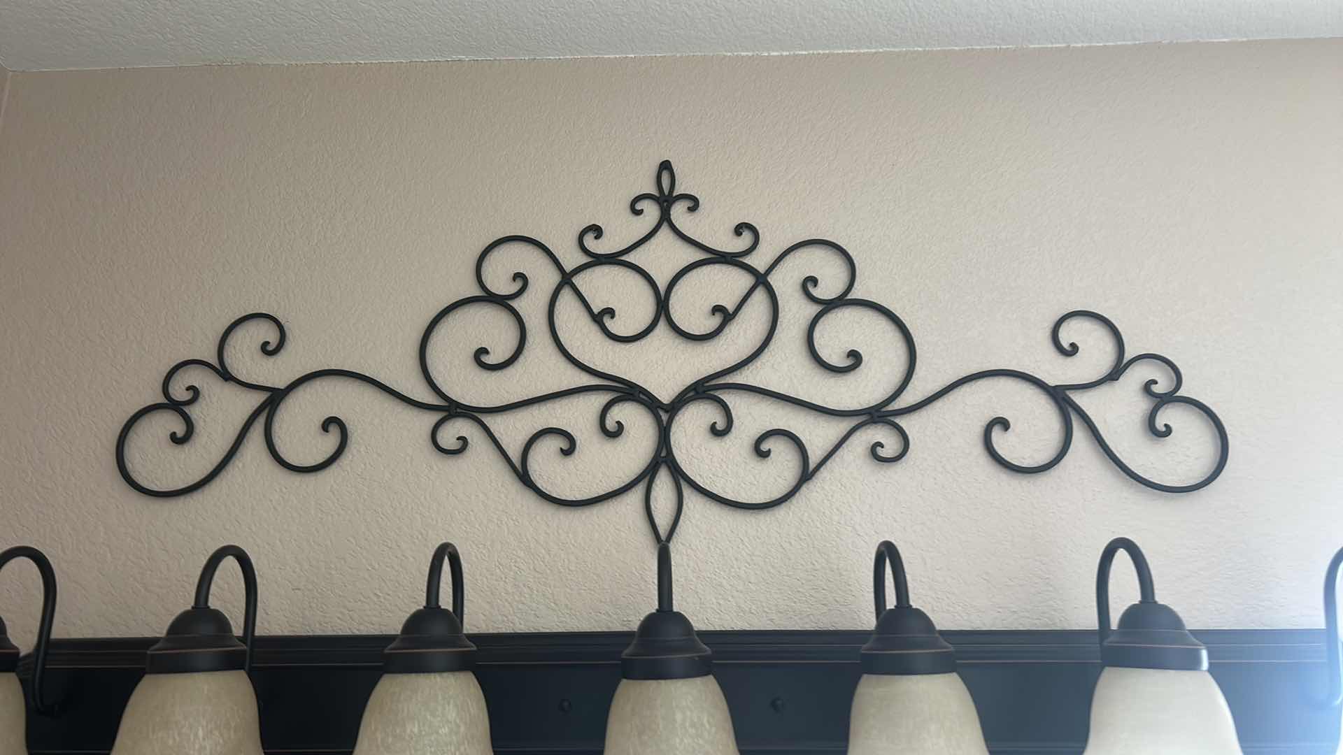 Photo 2 of METAL WALL DECOR 44” x 17”
