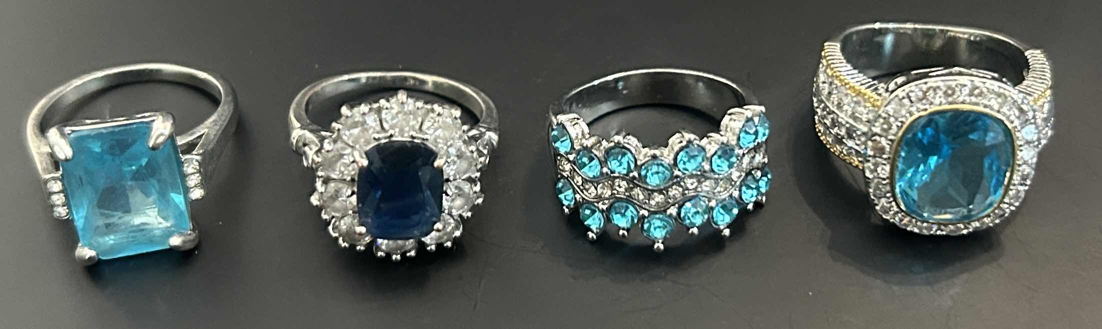 Photo 1 of 4-SILVER TONE W FAUX BLUE GEMSTONE RINGS (APPROX SIZE 7-8)