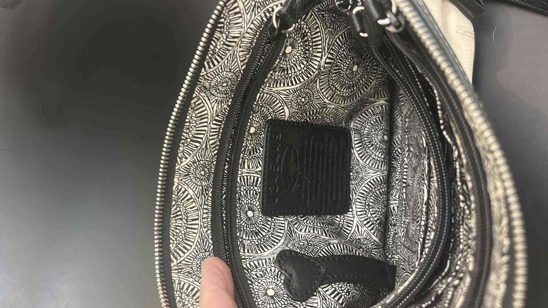 Photo 1 of BRIGHTON WHITE & BLACK LEONA CROSSBODY ORGANIZER HANDBAG