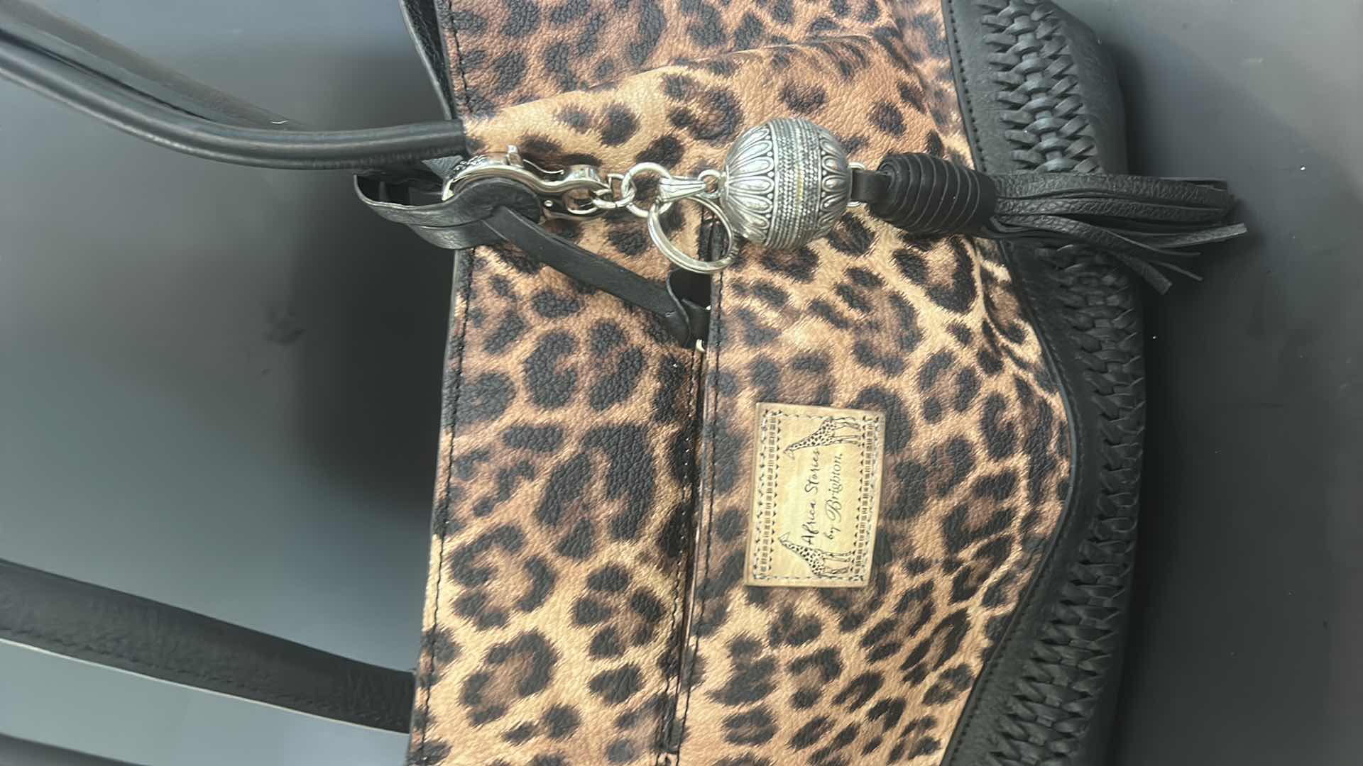 Photo 1 of BRIGHTON AYANNA AFRICAN STORIES LEOPARD & BLACK LEATHER TOTE HANDBAG