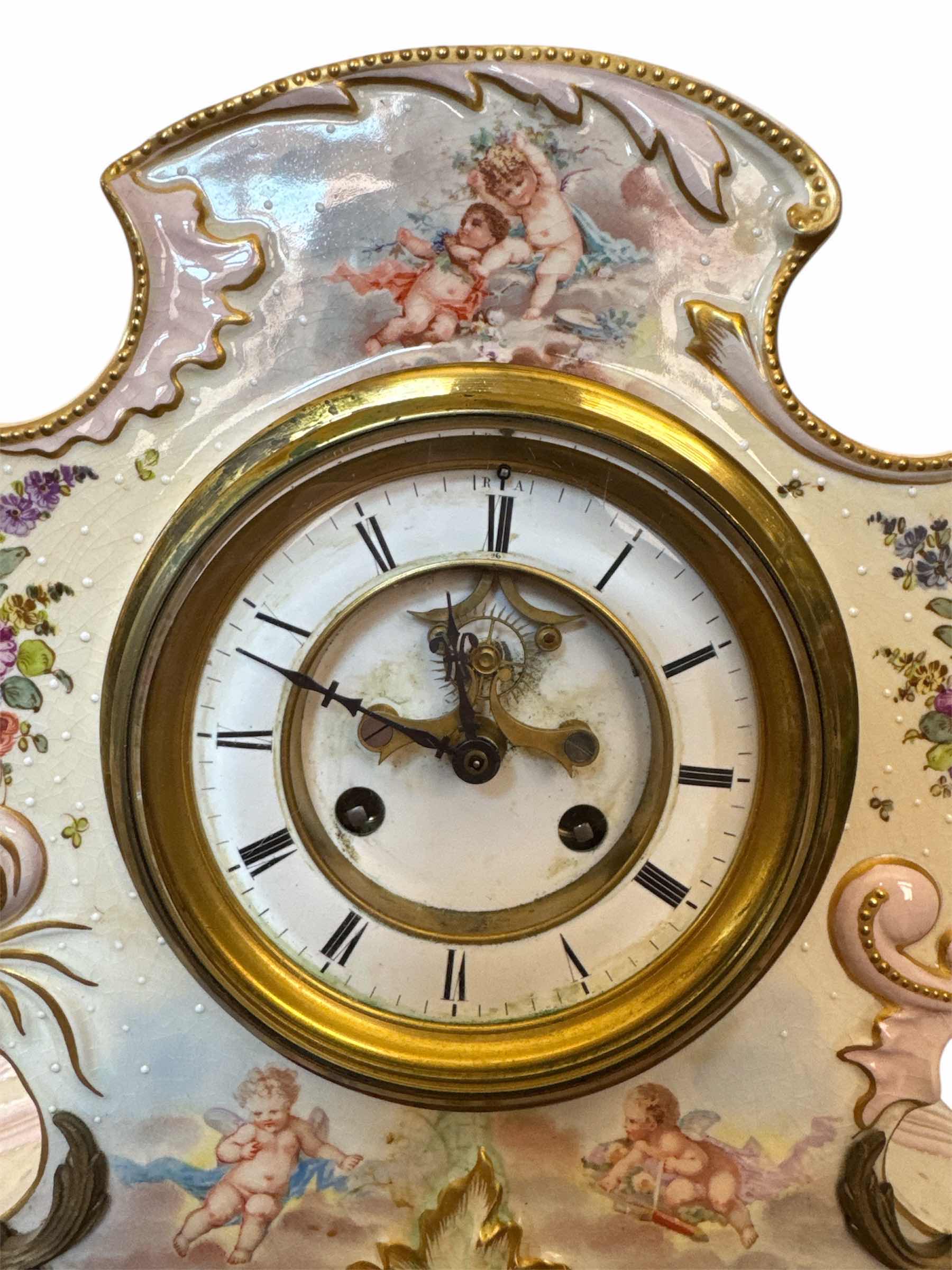 Photo 1 of ANTIQUE ANSONIA PORCELAIN CASE MANTEL CLOCK, ANGELS AND FLORAL

13” X 5.25” X H12”