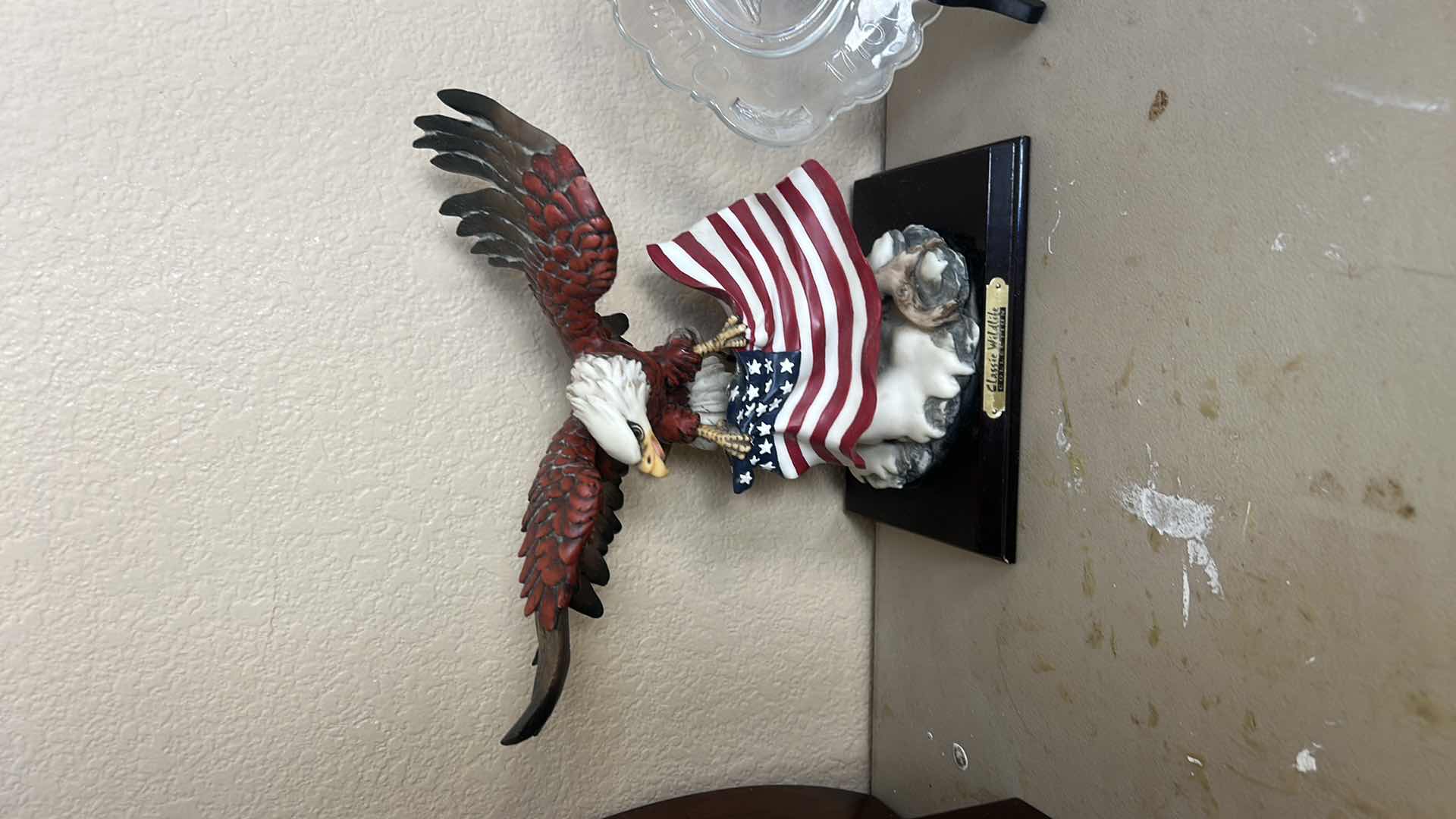Photo 1 of 2 - AMERICANA PIECES, EAGLE AND FLAG STATUE H9.5” AND BICENTENNIAL PLATE