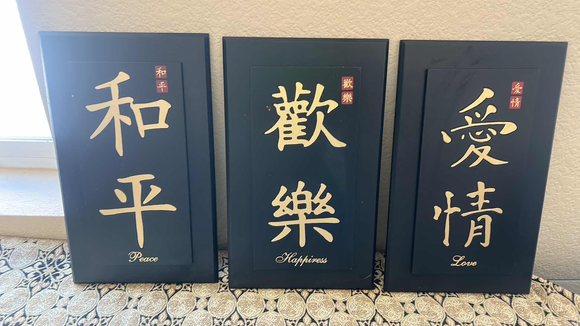 Photo 1 of ASIAN DECOR - GOLD AND BLACK TABLE RUNNER, 3 BLACK AND GOLD PANELS , & LAUGHING BUDDAH H 8”