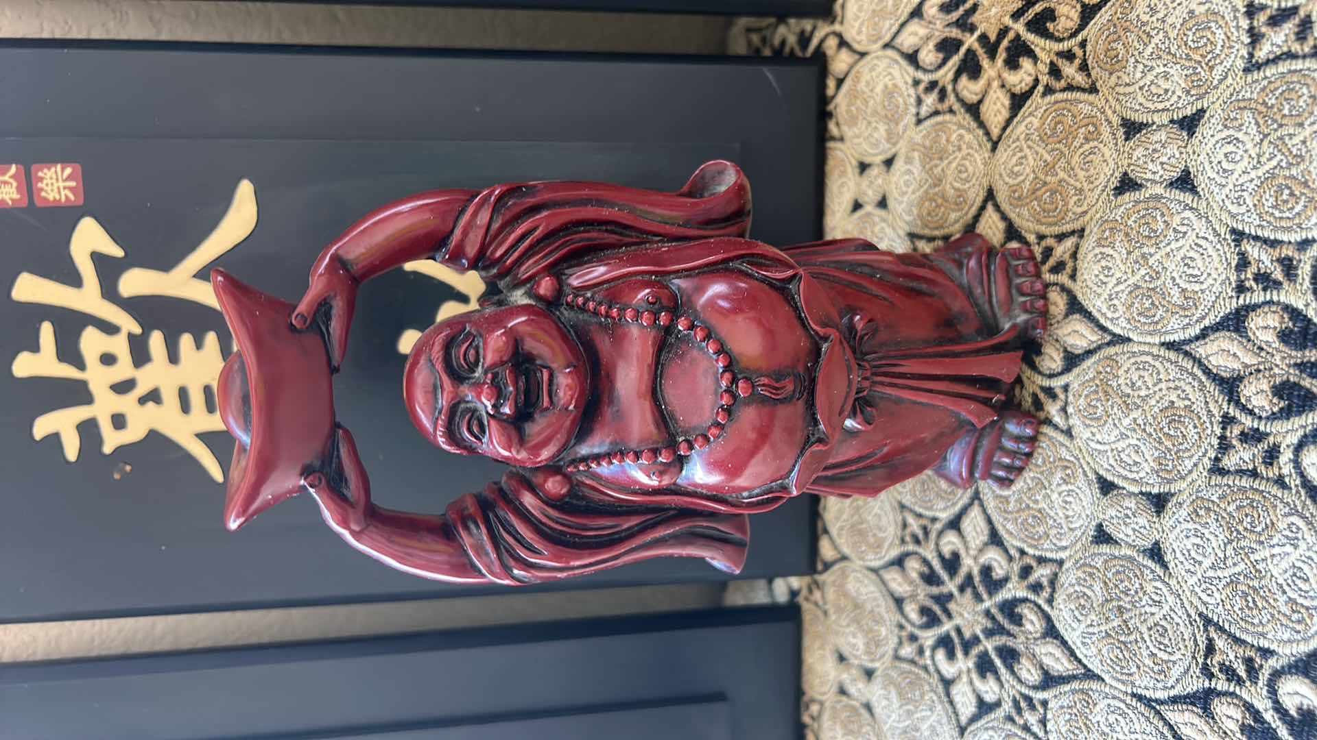 Photo 1 of ASIAN DECOR - GOLD AND BLACK TABLE RUNNER, 3 BLACK AND GOLD PANELS , & LAUGHING BUDDAH H 8”