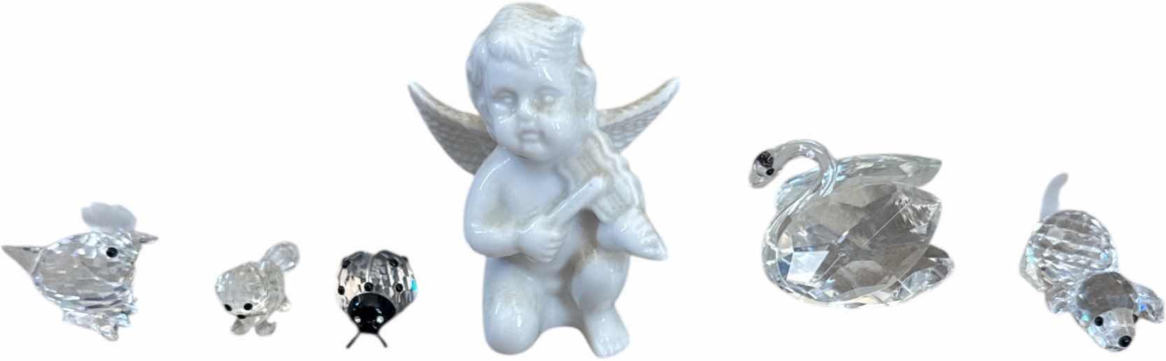 Photo 1 of 6- VINTAGE MINIATURE FIGURINES, HOME DECOR, ANGEL, SWAN, HEN, LADYBUG, CAT, AND DOG COLLECTABLE ITEMS

H2” AND SMALLER