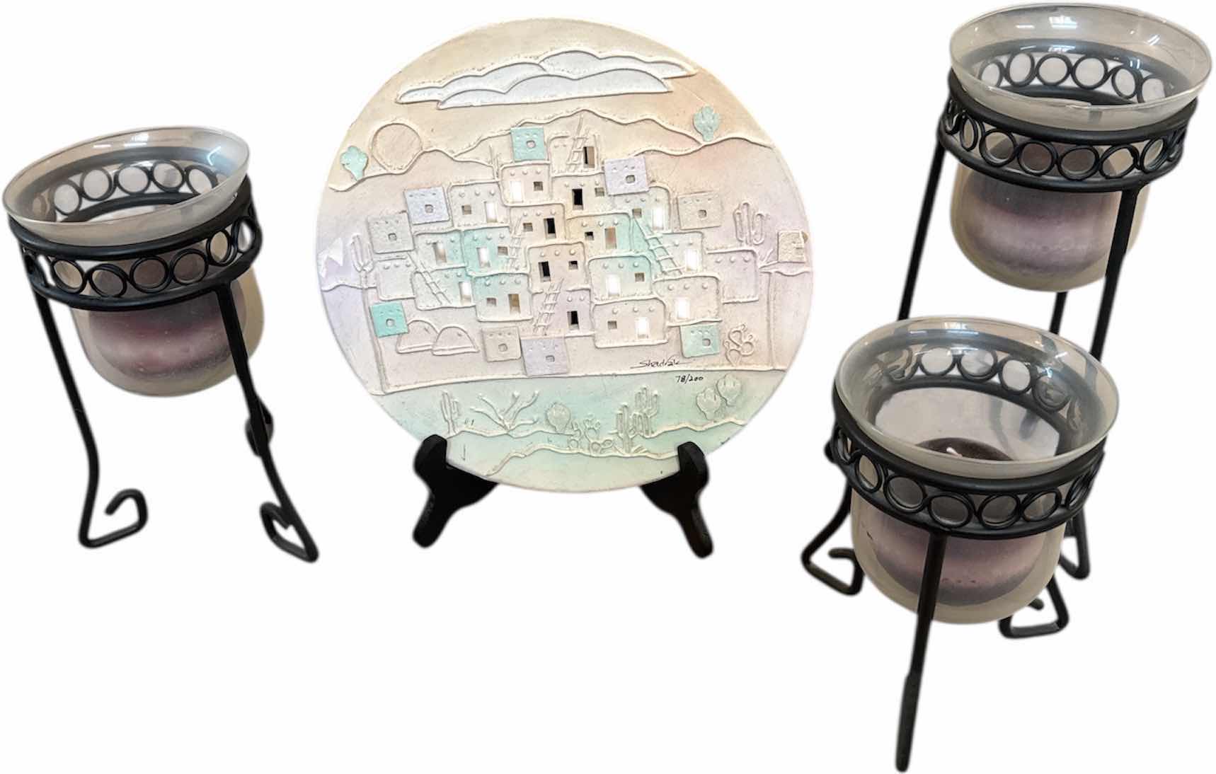 Photo 1 of 4- VINTAGE LA TAMITO BY SHADRAK 78/200, ARTWORK, AND 3 METAL CANDLEHOLDERS, BLACK

PLATE
D10”