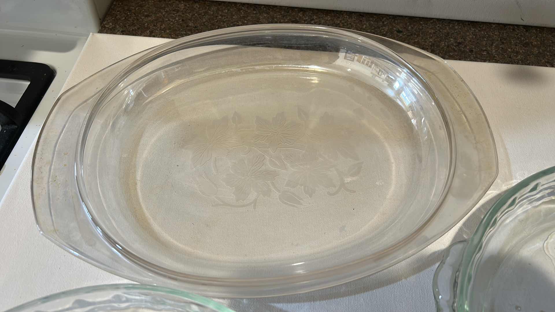 Photo 1 of 2 10” PYREX DISHES AND 1 FLOWER MOTIF DISH