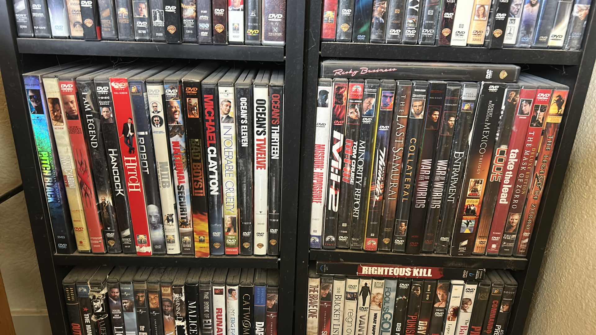 Photo 1 of 2 BLACK SHELVING UNITS WITH DVD’s