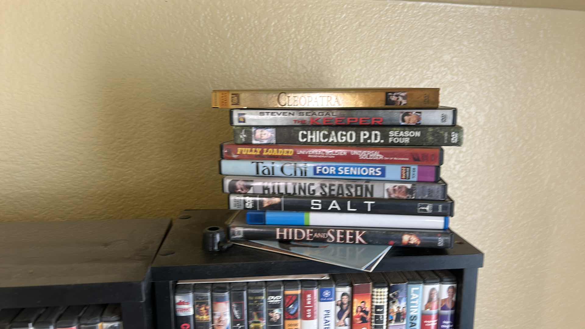 Photo 1 of 2 BLACK SHELVING UNITS WITH DVD’s